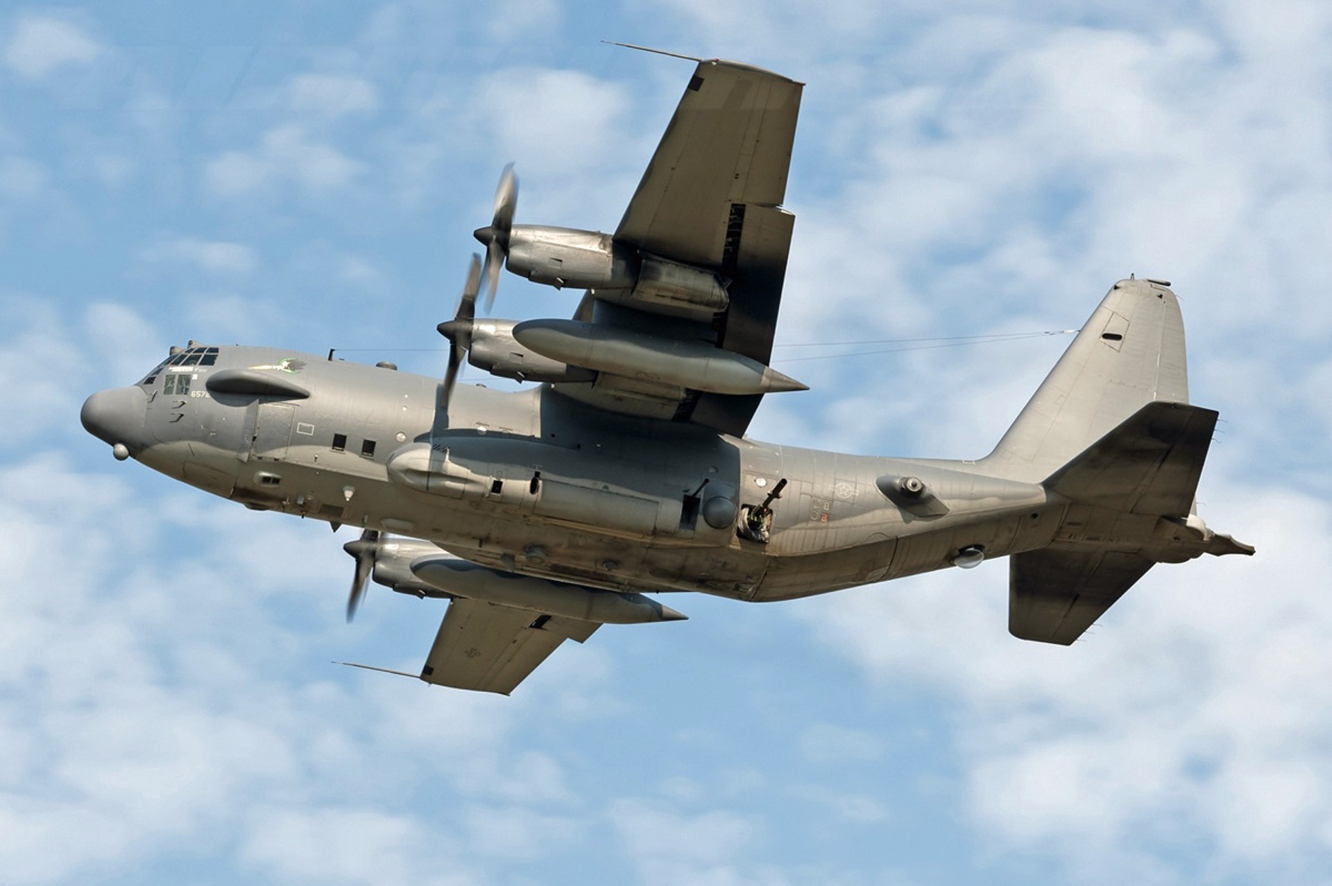Lockheed AC-130H Hercules gunship in flight HD Wallpaper