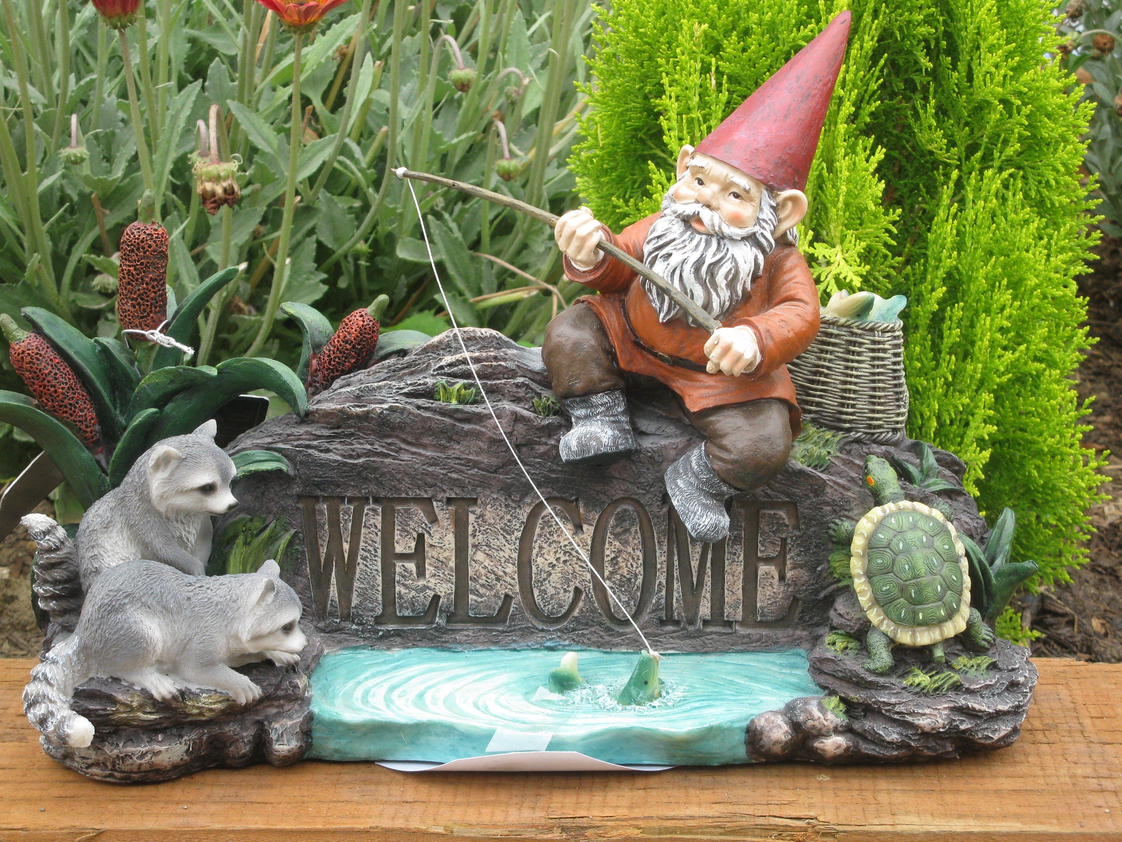 Gnome fishing with raccoons and turtle welcome sign HD Wallpaper