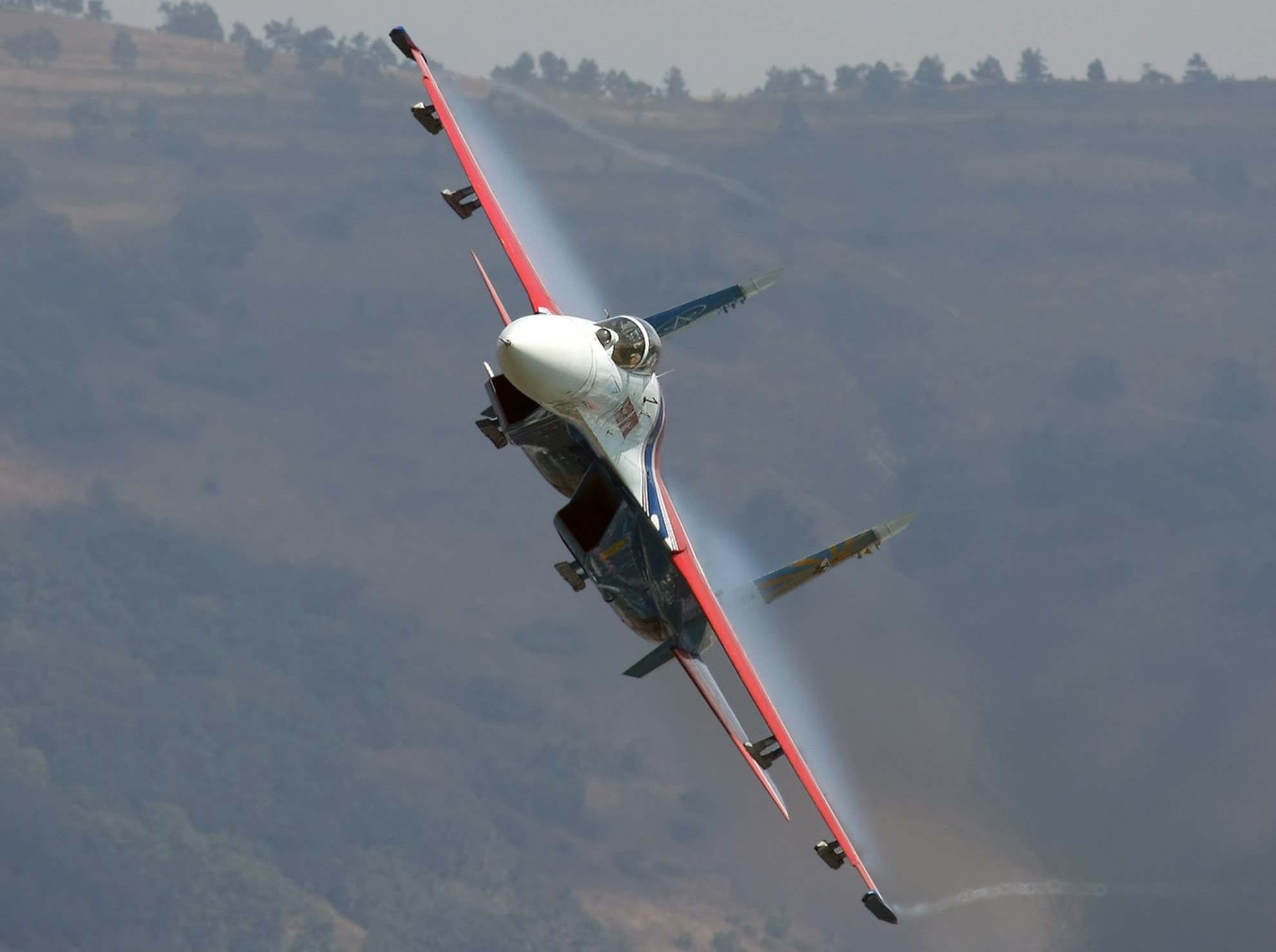 Sukhoi Su-27 fighter jet performing aerobatics HD Wallpaper