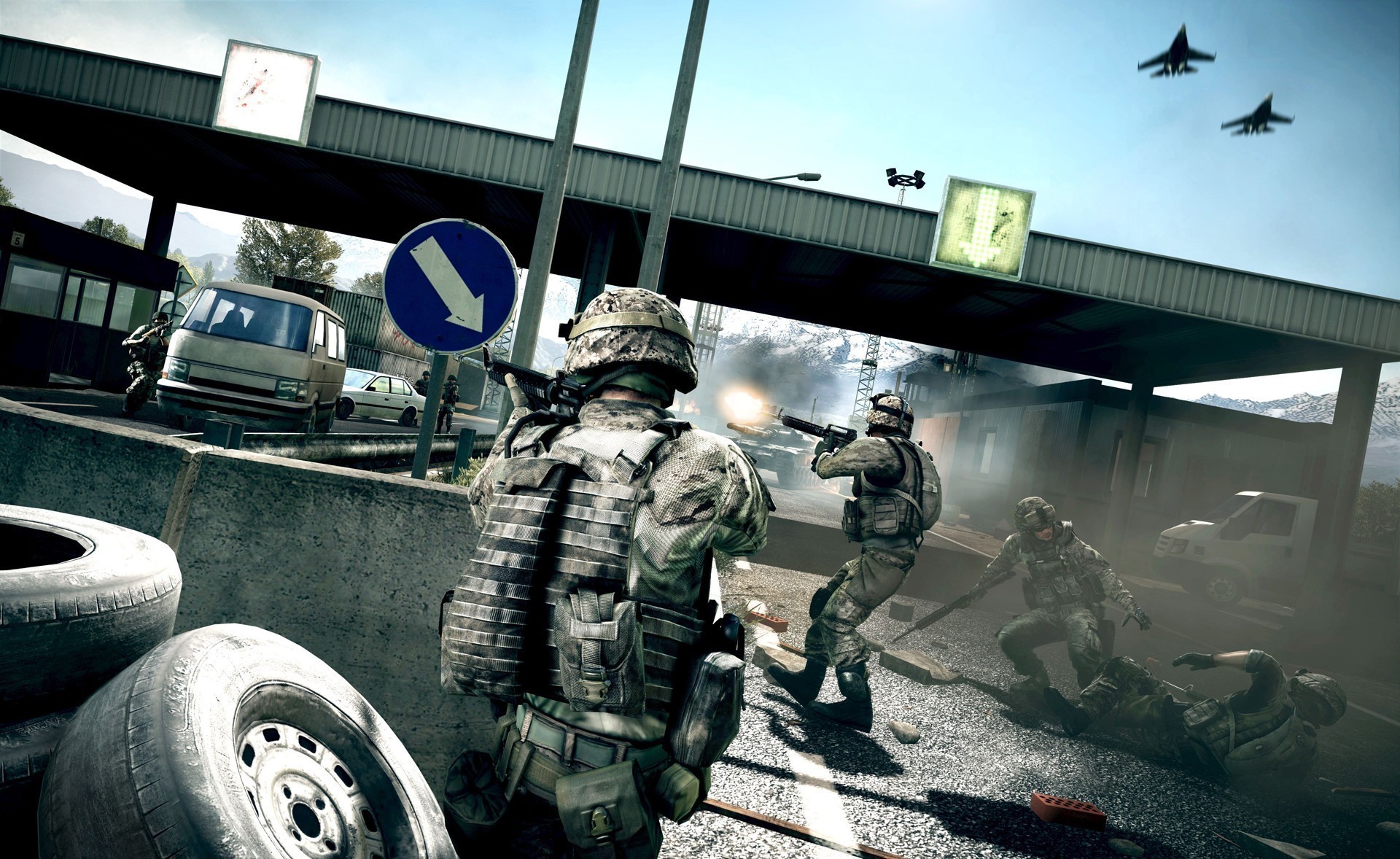 Soldiers in combat at a checkpoint with jets overhead HD Wallpaper