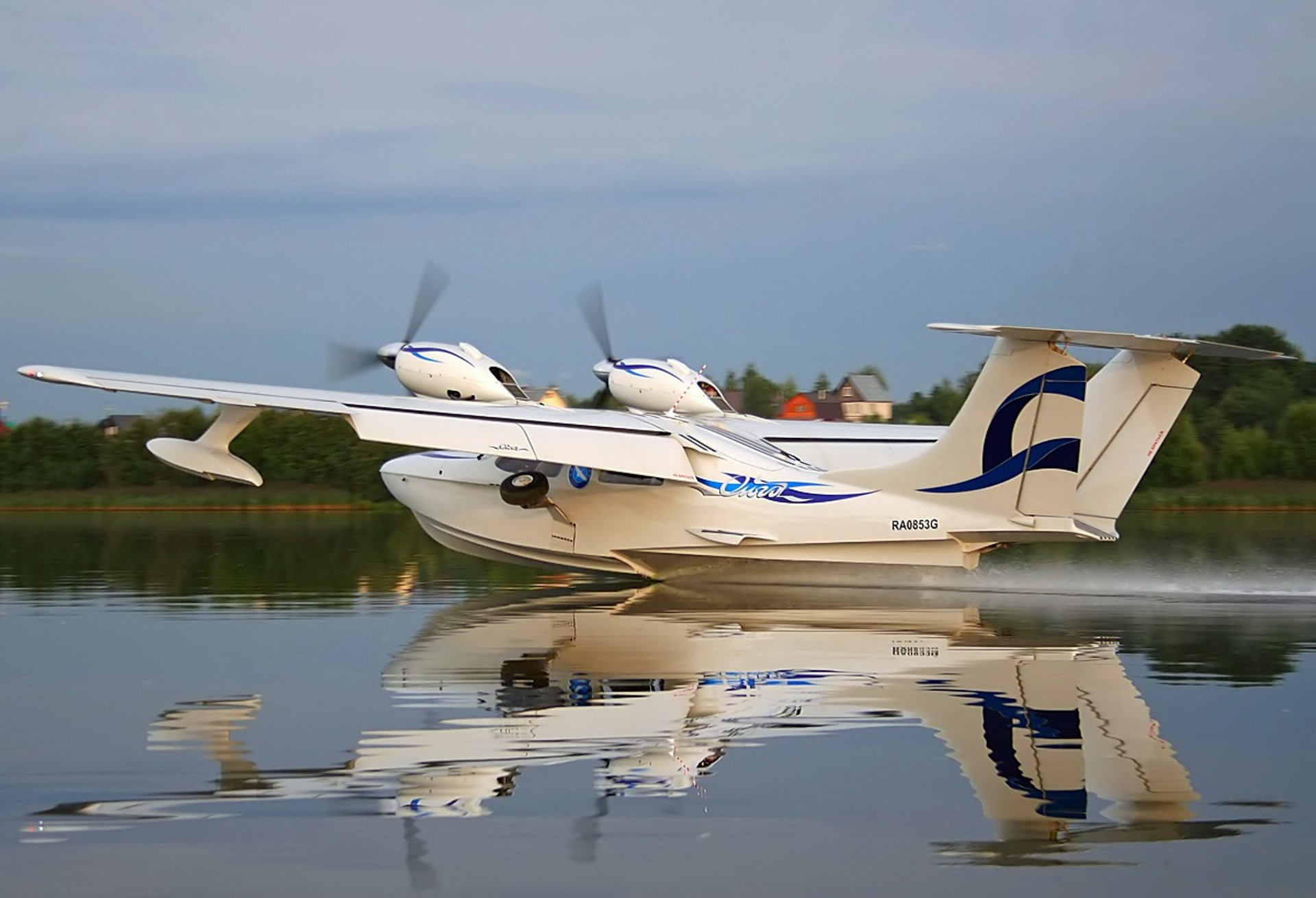 White seaplane taking off from water HD Wallpaper
