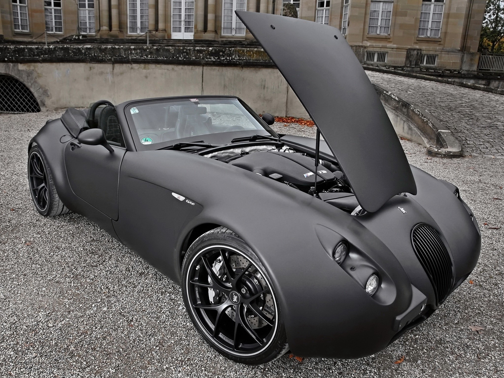 Matte black Wiesmann convertible with hood open HD Wallpaper