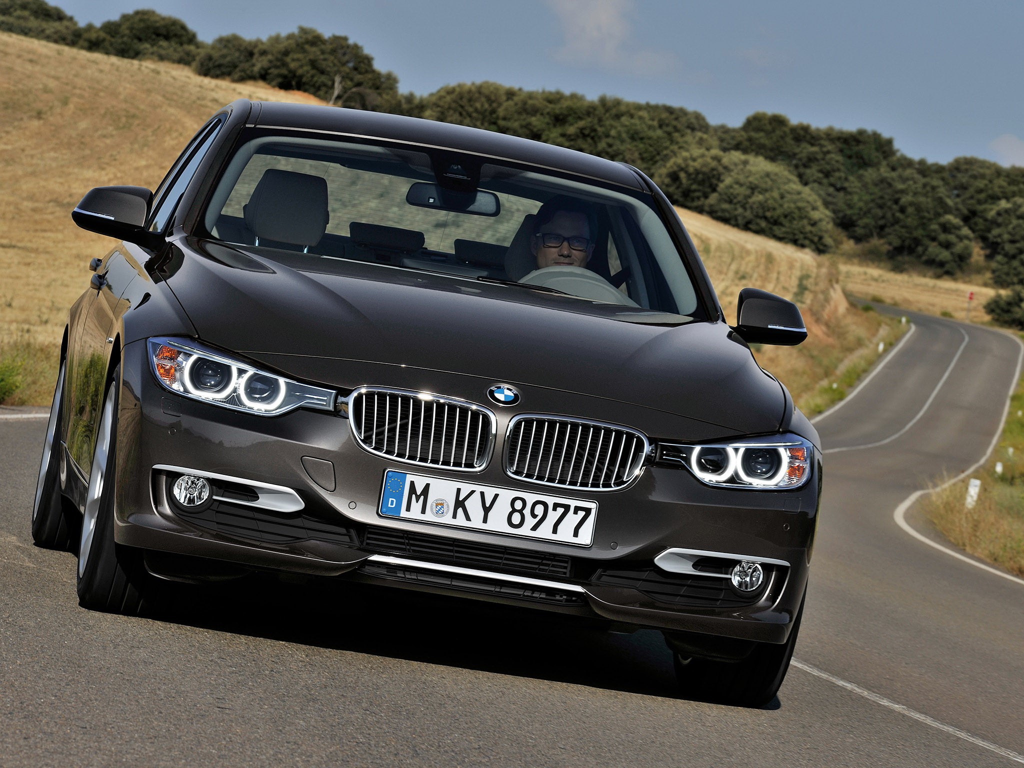 BMW 3 Series Sedan on a Winding Road HD Wallpaper