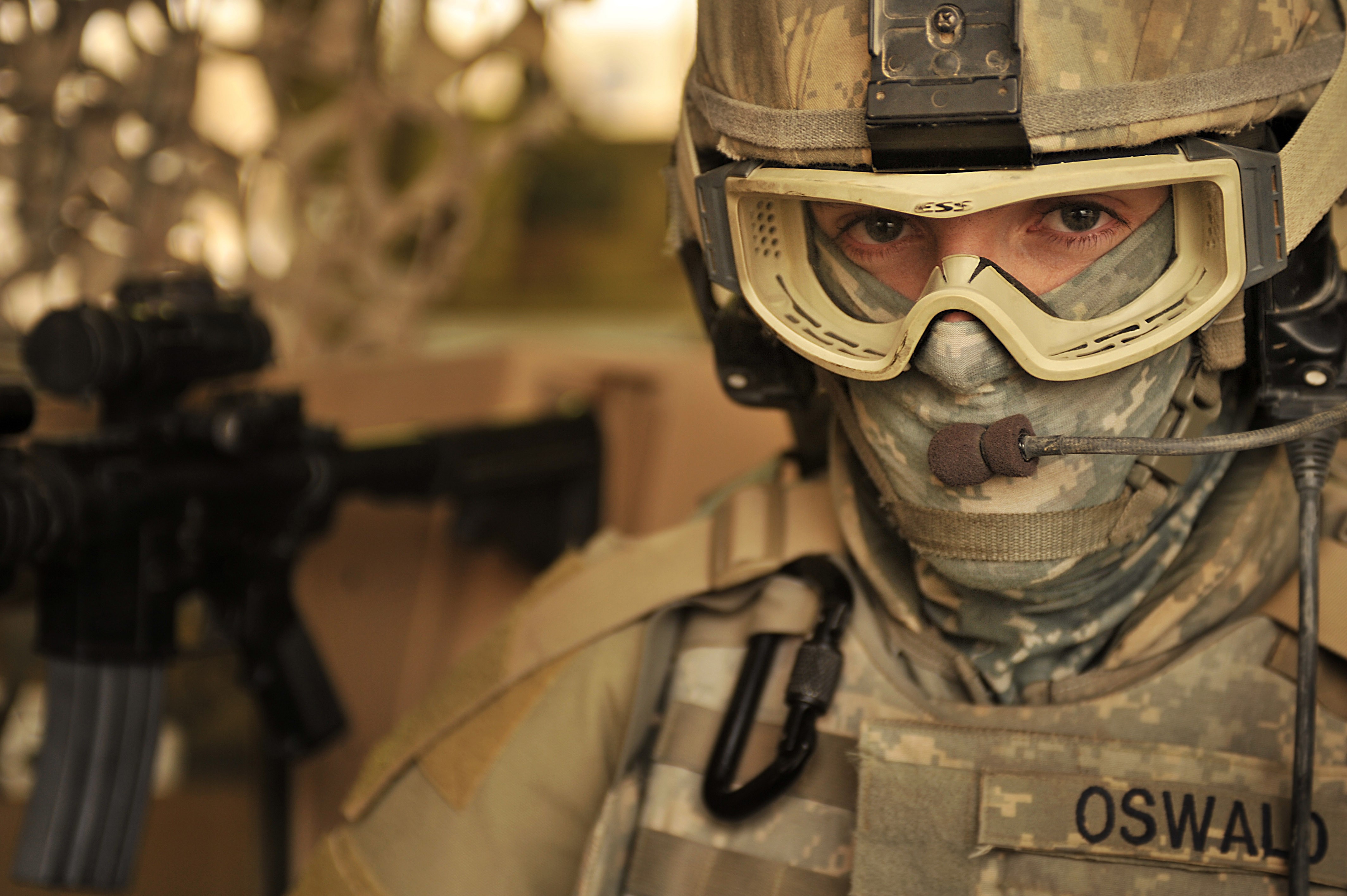 Soldier wearing tactical gear and glasses HD Wallpaper