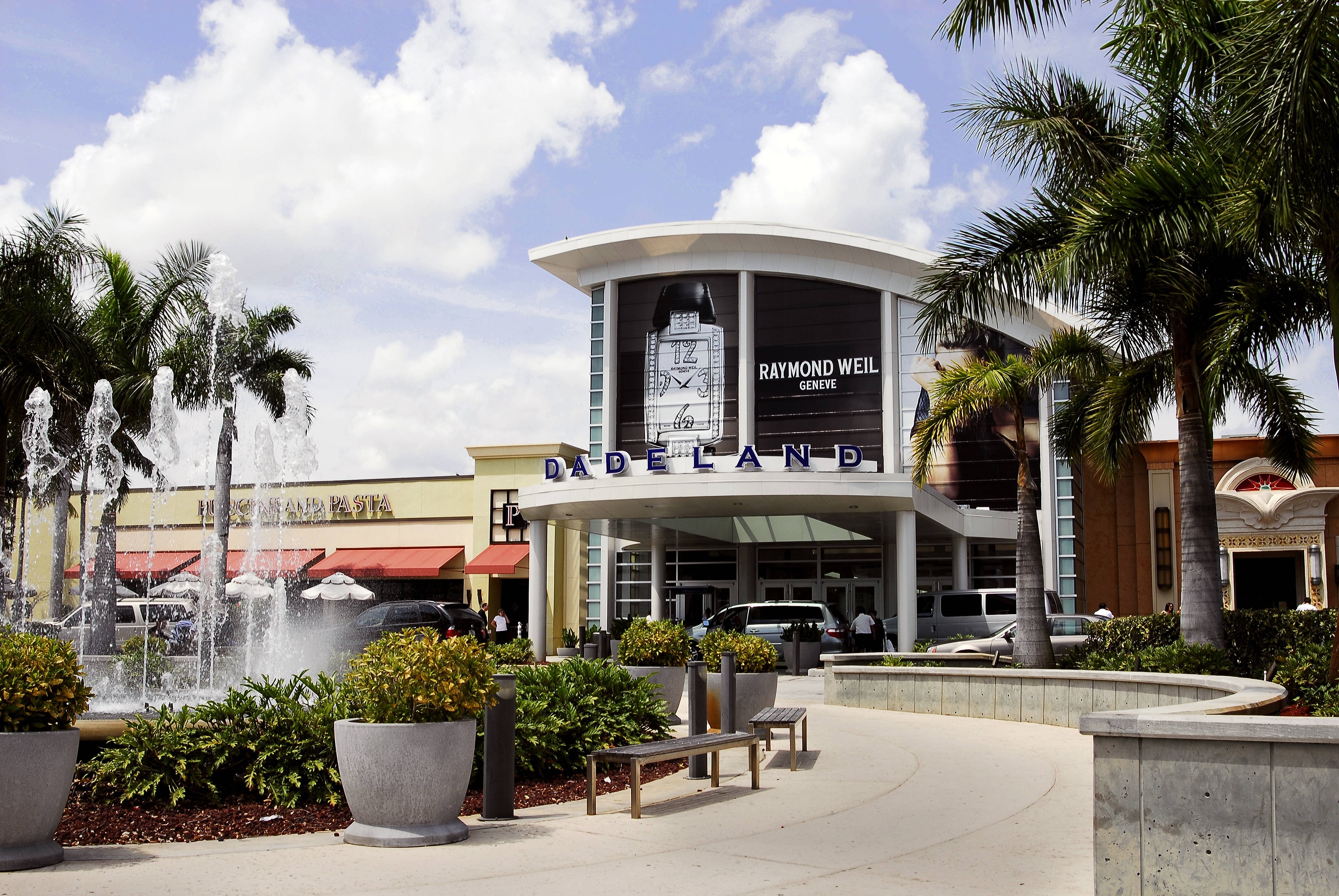 Dade Land Shopping Center with Raymond Weil Ad HD Wallpaper