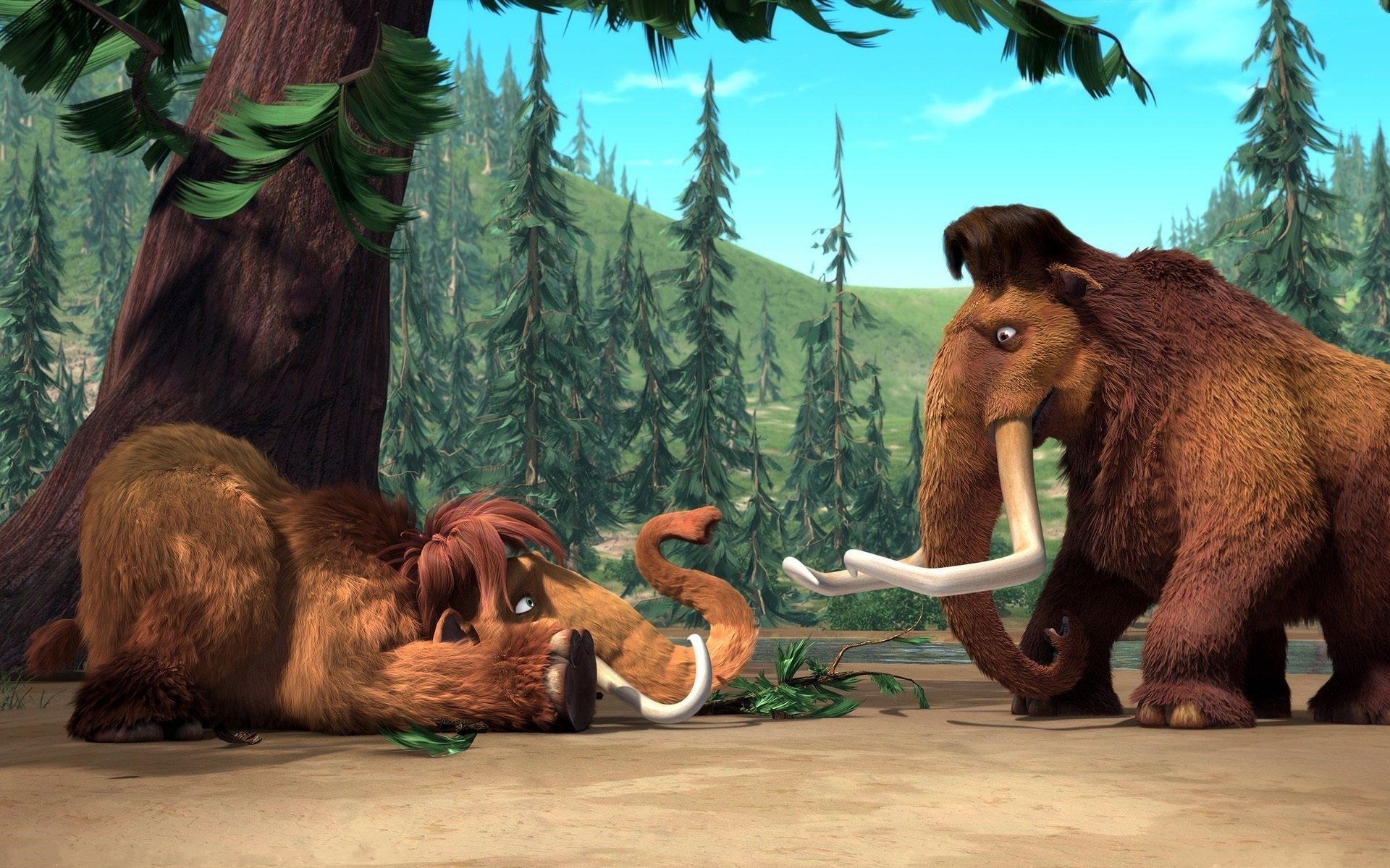 Two mammoths in a forest HD Wallpaper