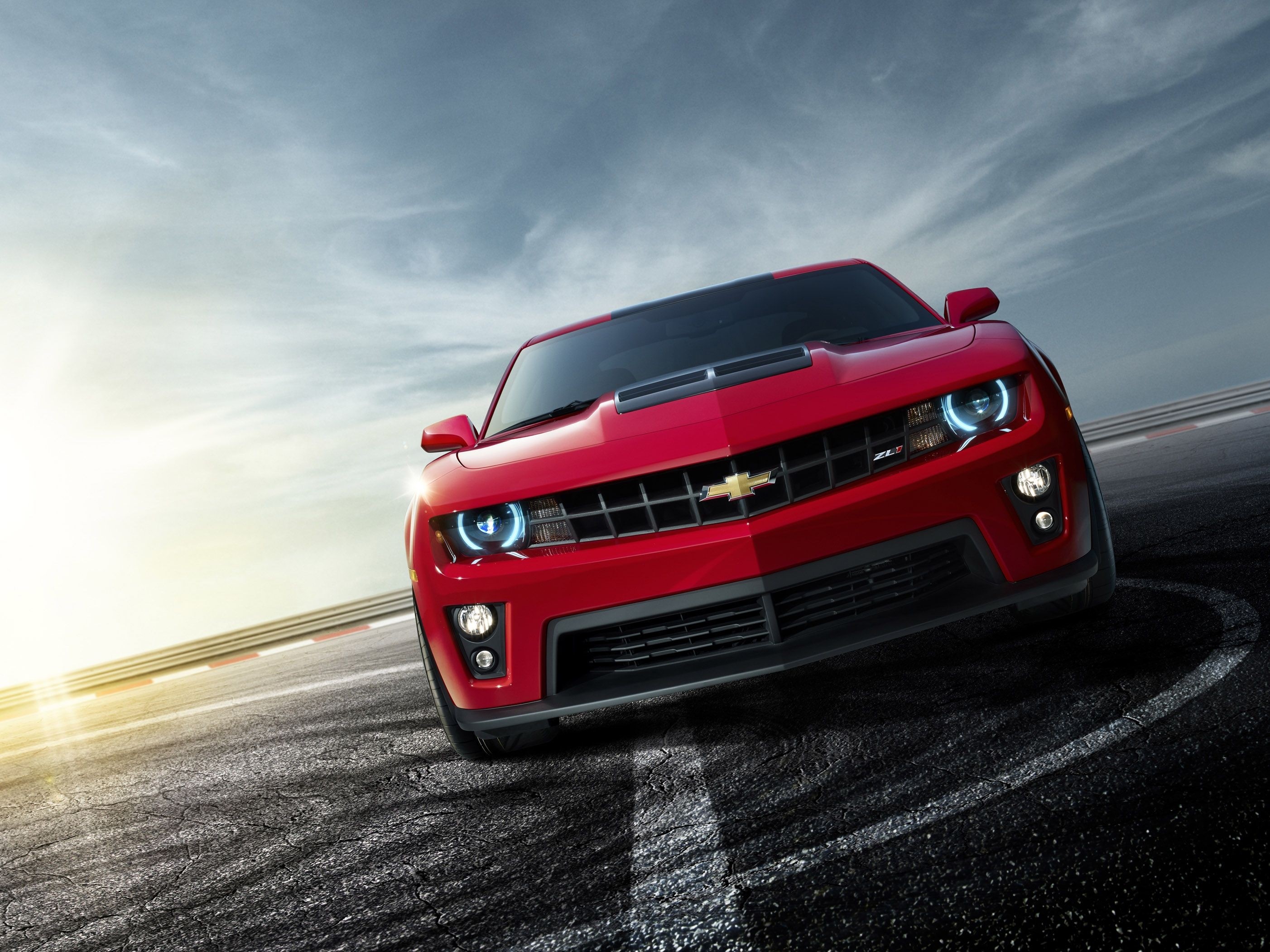 Red Chevrolet Camaro ZL1 on a Racetrack HD Wallpaper