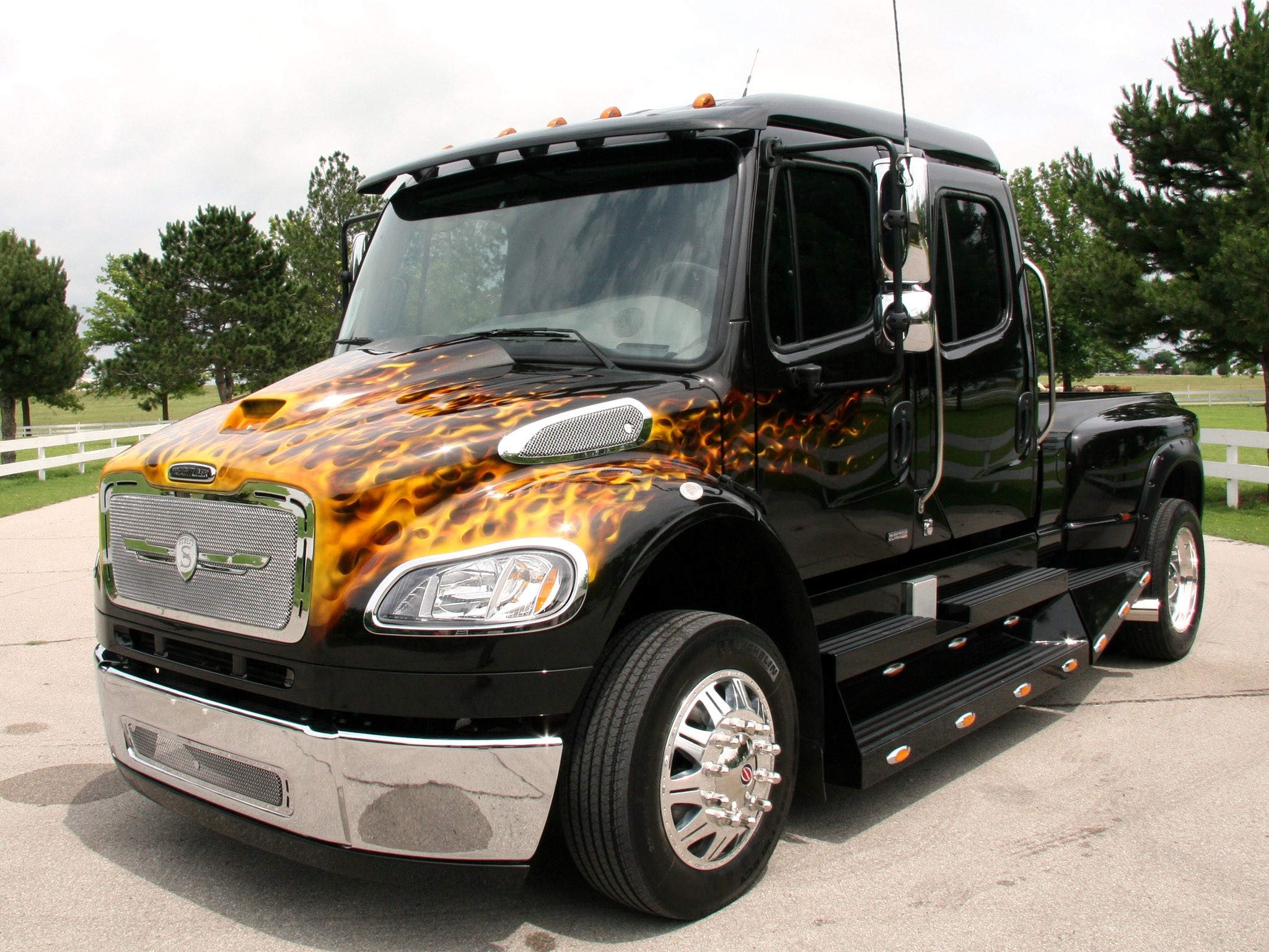 Black Freightliner truck with flame graphics HD Wallpaper
