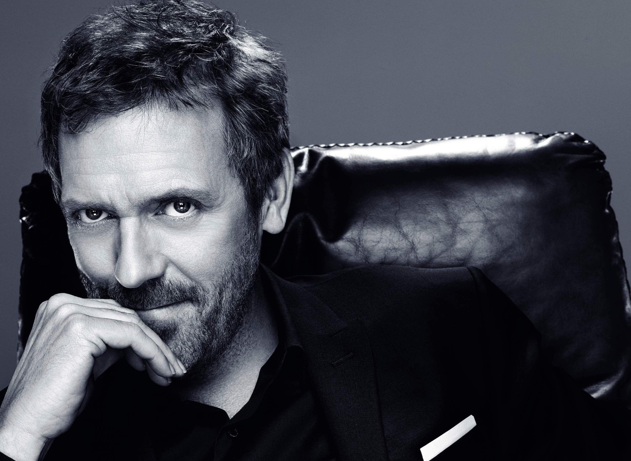 Hugh Laurie in a black suit HD Wallpaper