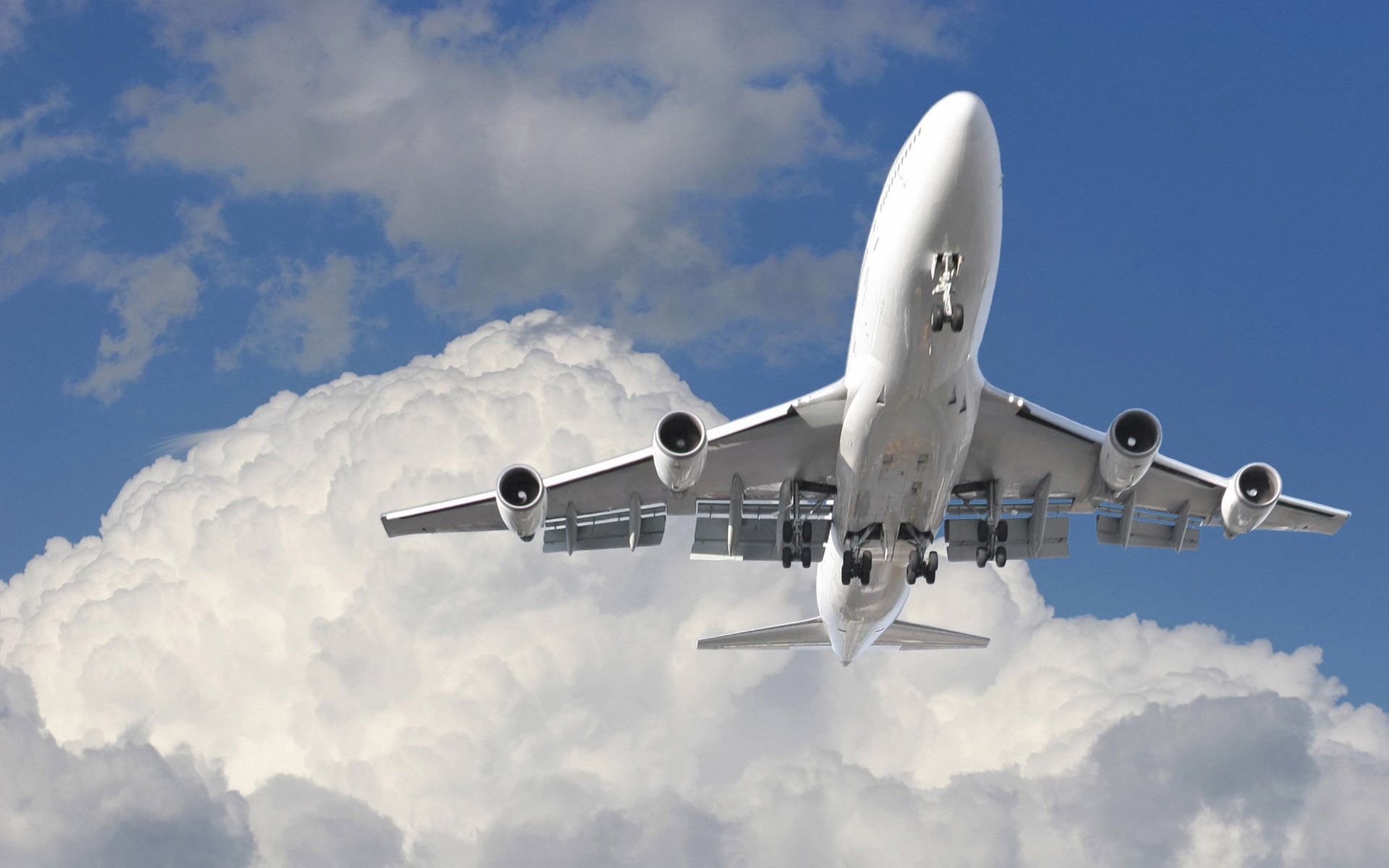 Boeing 747 airplane flying through clouds HD Wallpaper