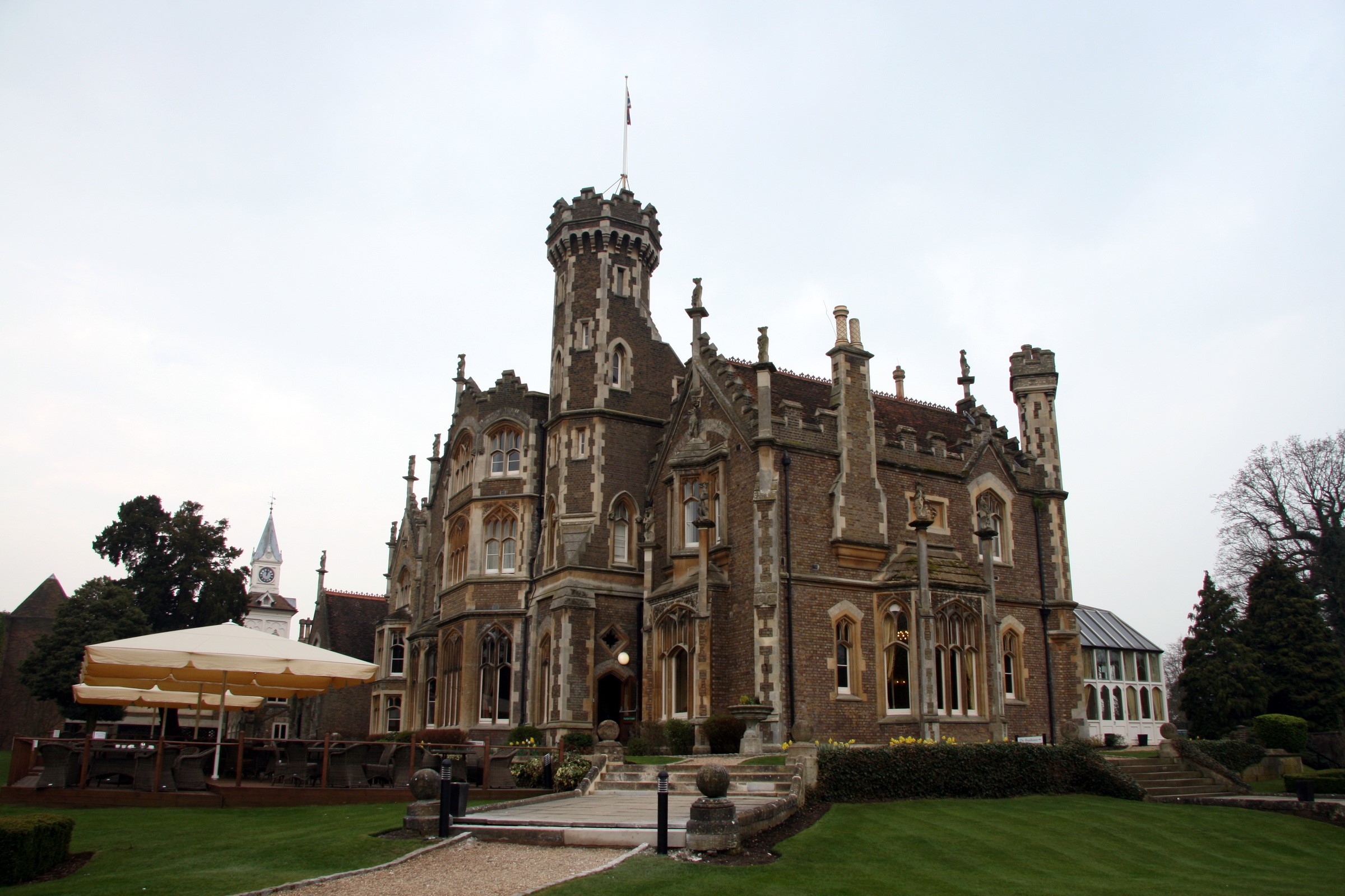 Gothic building with a tower and clock tower in Windsor, United Kingdom HD Wallpaper