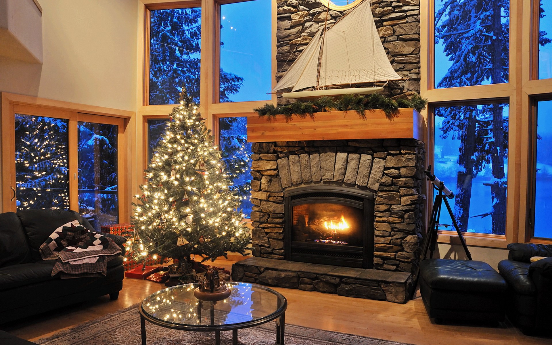 Christmas tree and fireplace in a snowy cabin HD Wallpaper