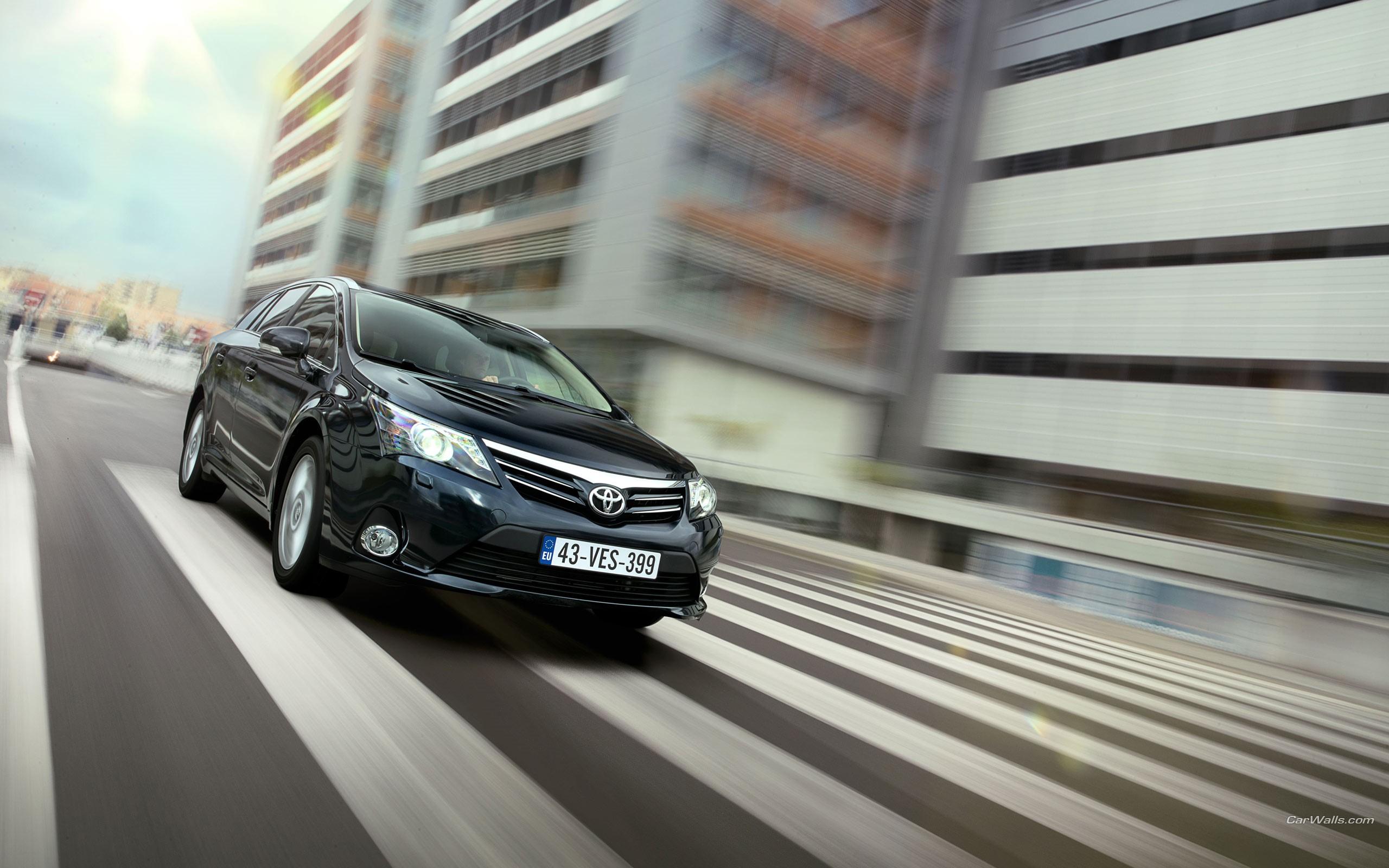 Black Toyota Avensis Wagon on Pedestrian Crossing HD Wallpaper