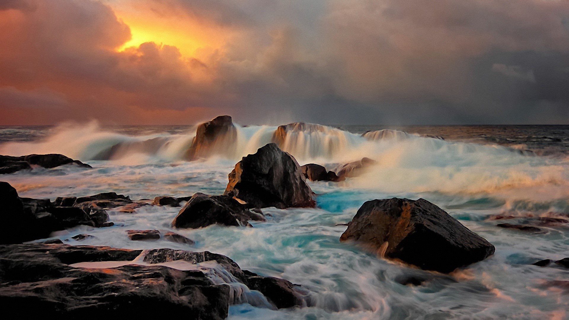 Waves crashing on rocks during sunset HD Wallpaper