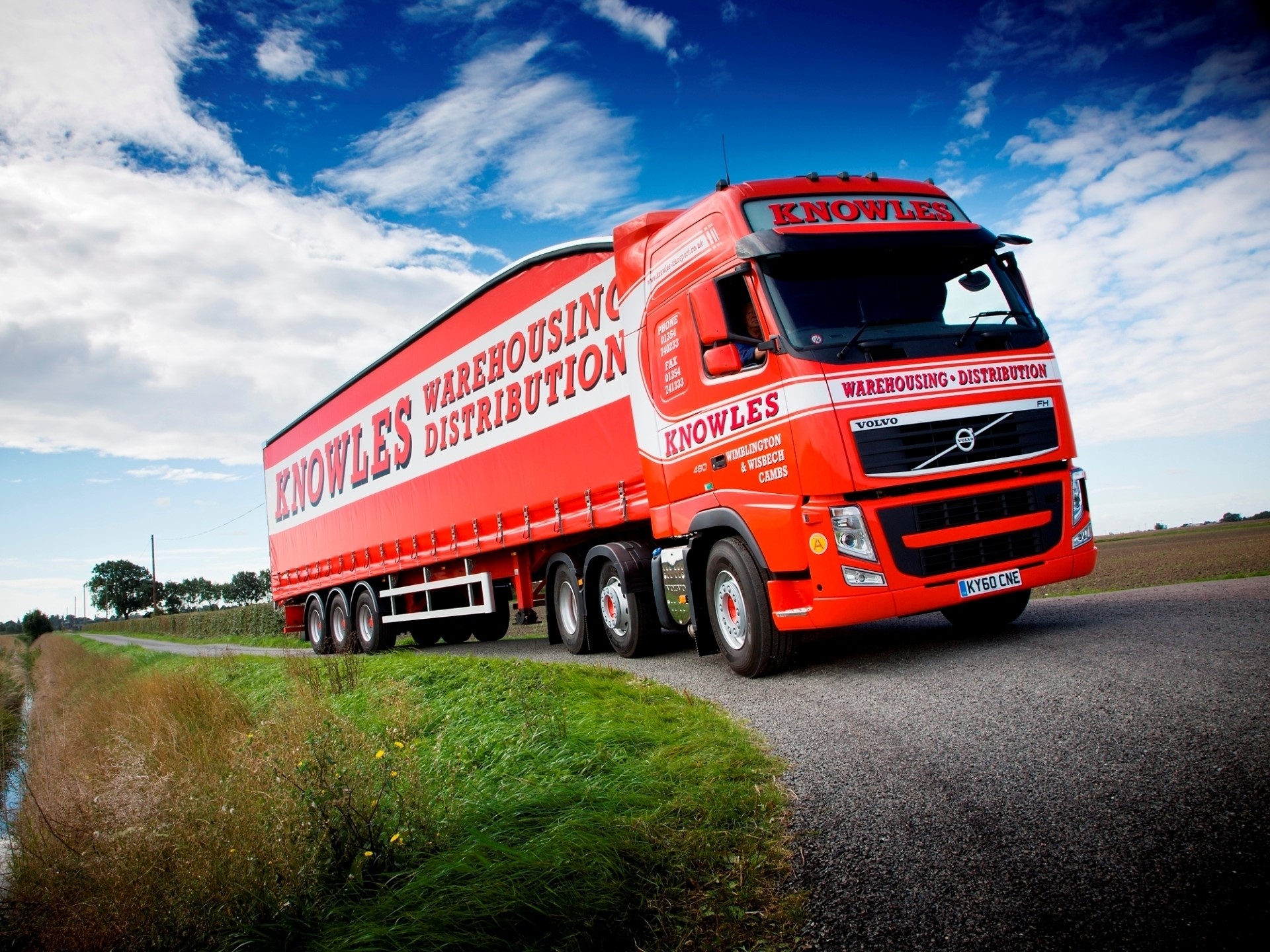 Red Volvo Truck with Knowles Warehousing Distribution Trailer HD Wallpaper