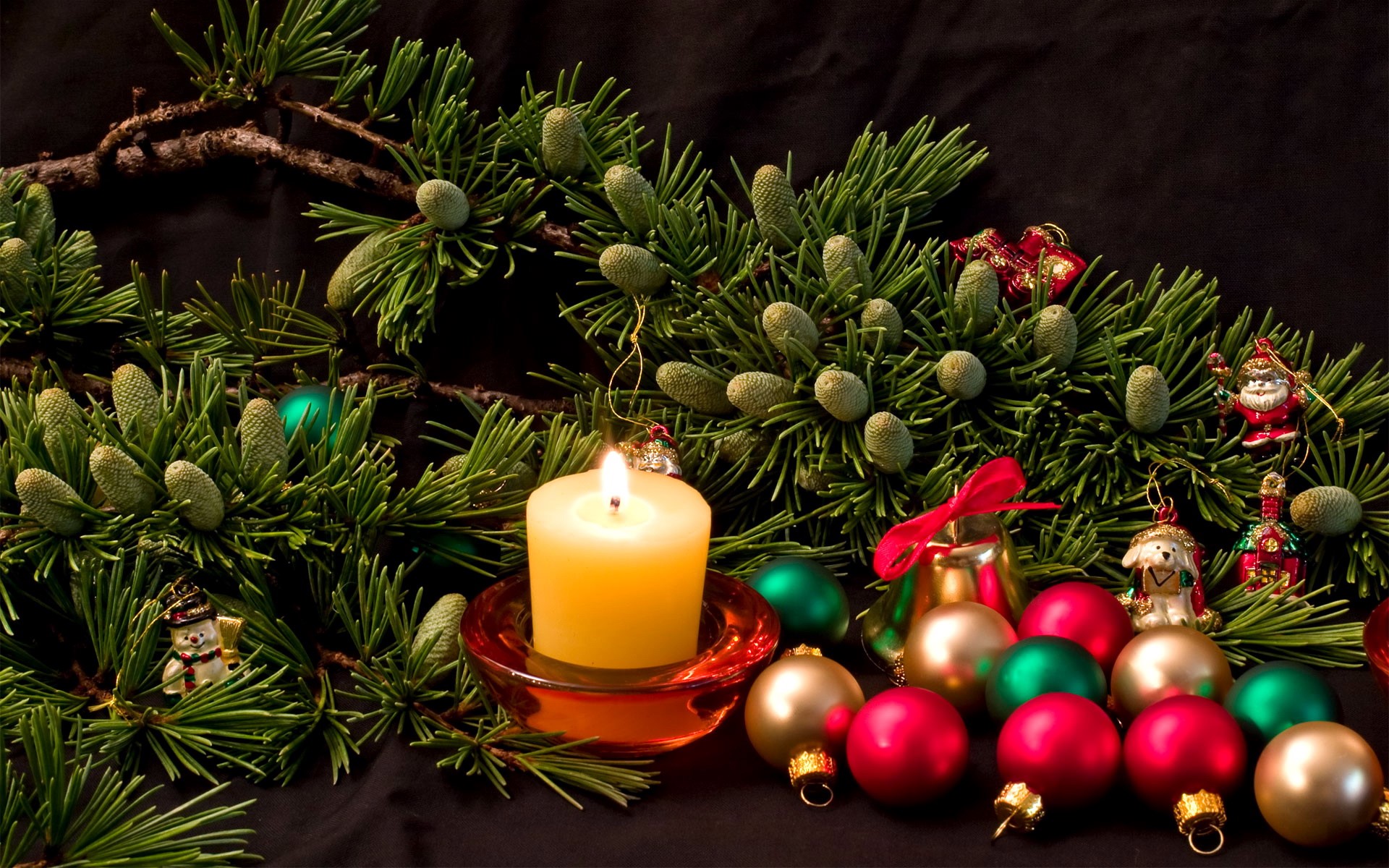 Christmas pine branches with ornaments and candle HD Wallpaper