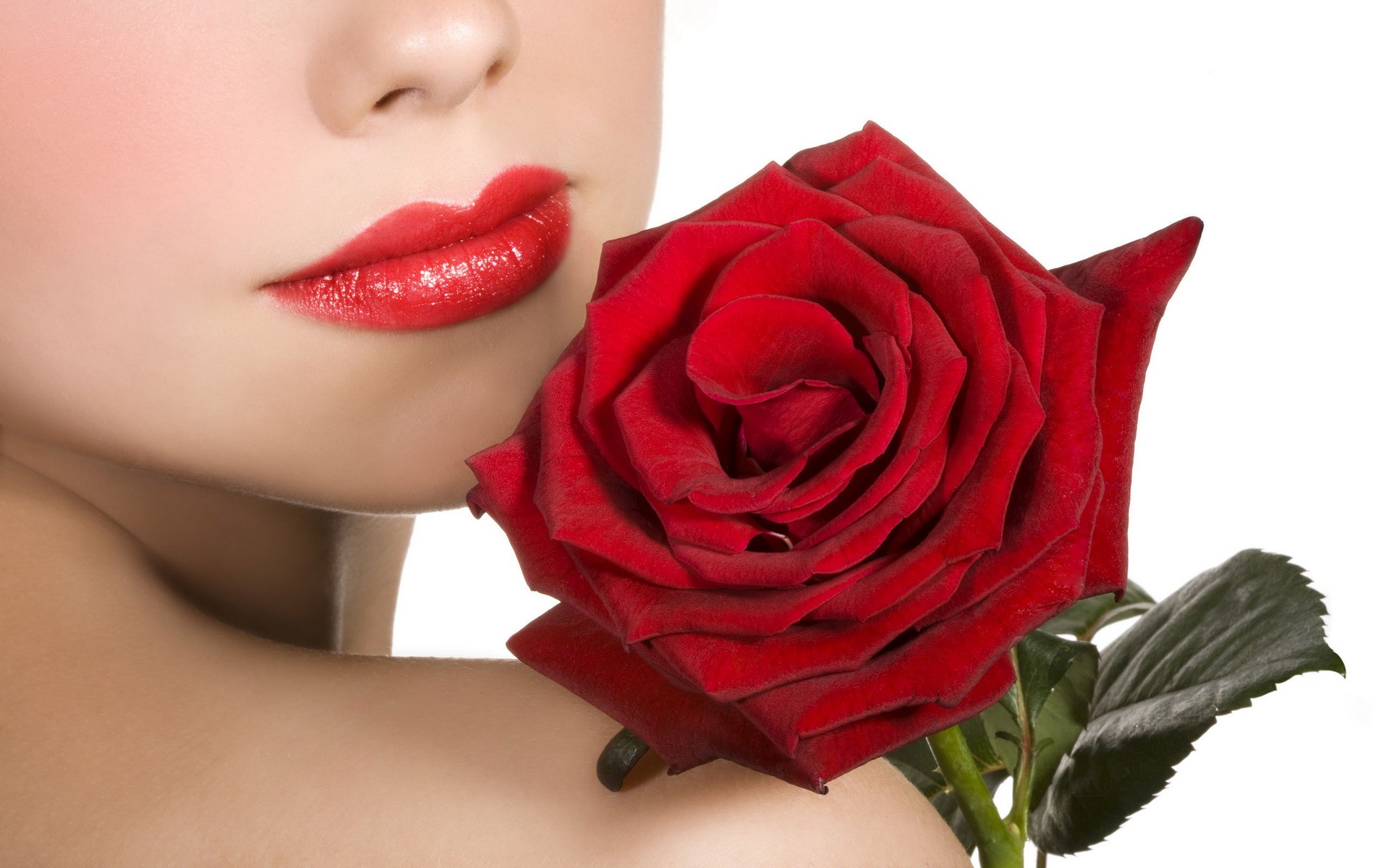 Woman with red lips holding a red rose HD Wallpaper