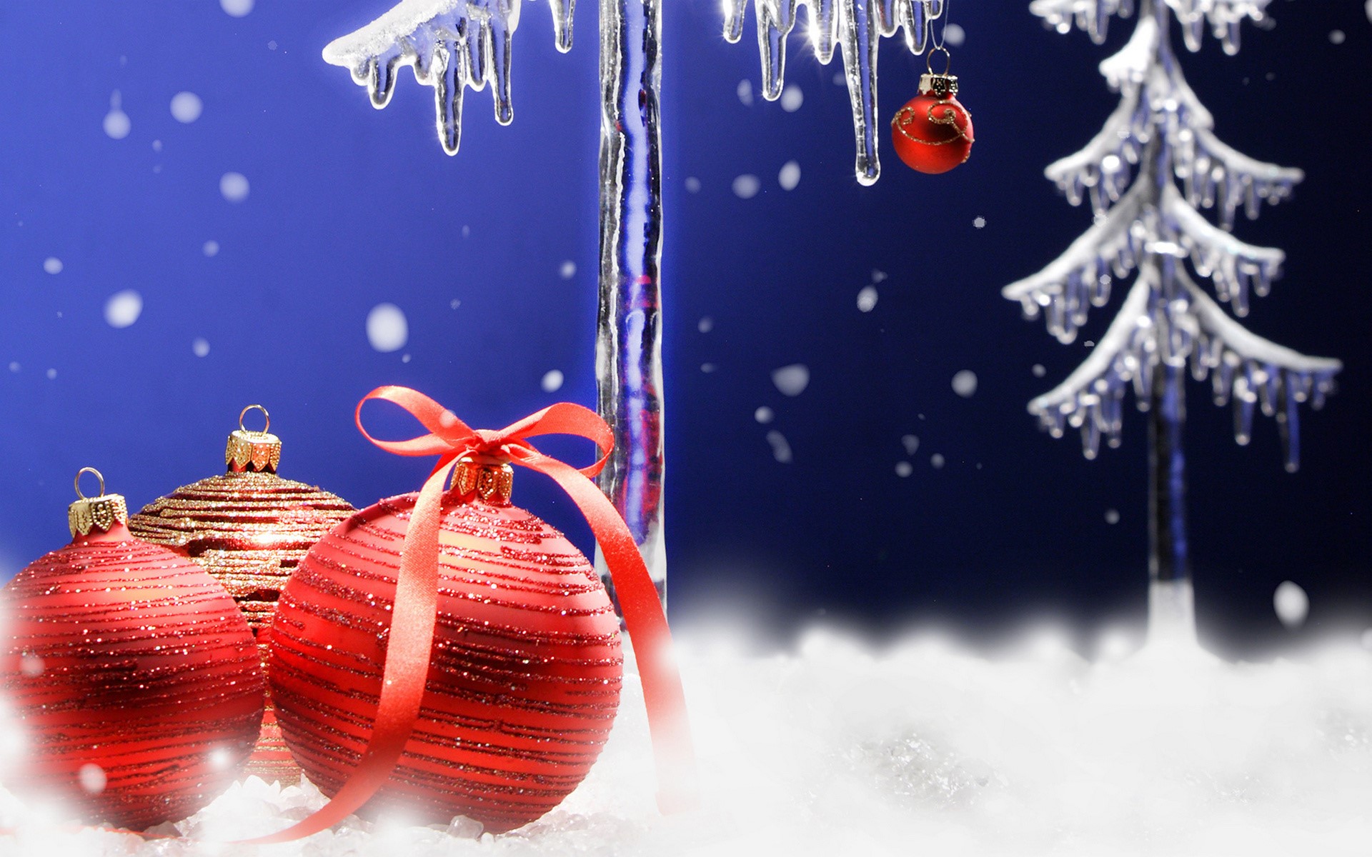 Christmas ornaments and icicles on a blue background HD Wallpaper