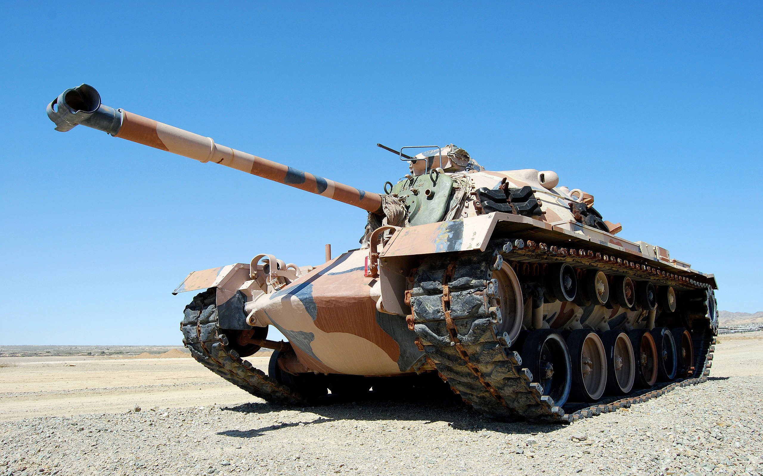 Camouflaged Tank in Desert Landscape HD Wallpaper