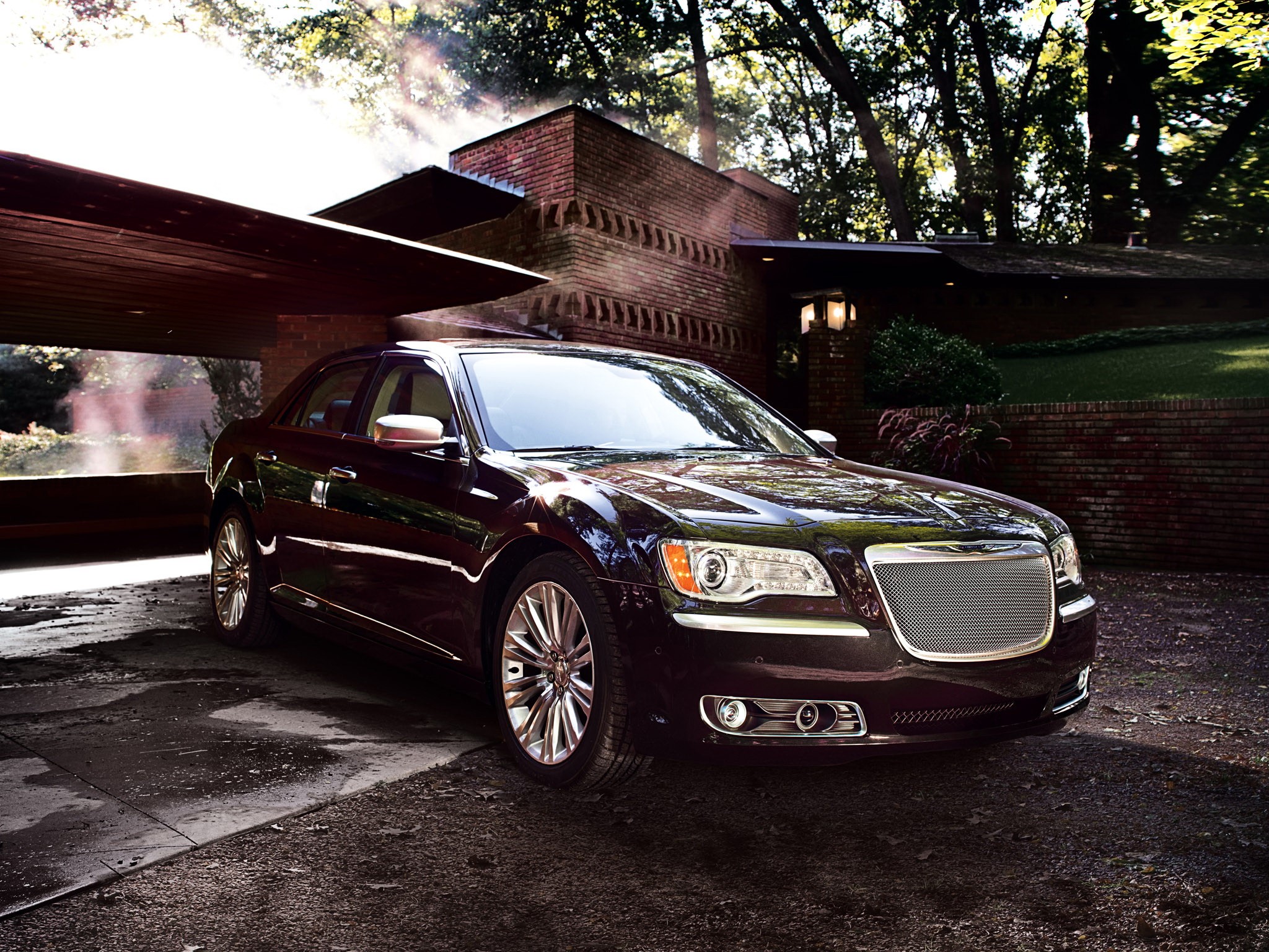 Chrysler 300 sedan parked near a brick house HD Wallpaper
