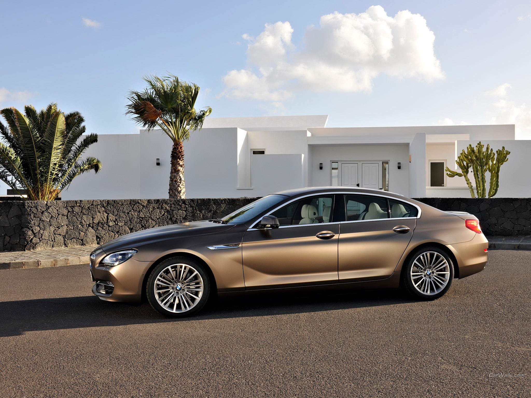 BMW 6 Series Gran Coupe parked in front of a modern white house HD Wallpaper