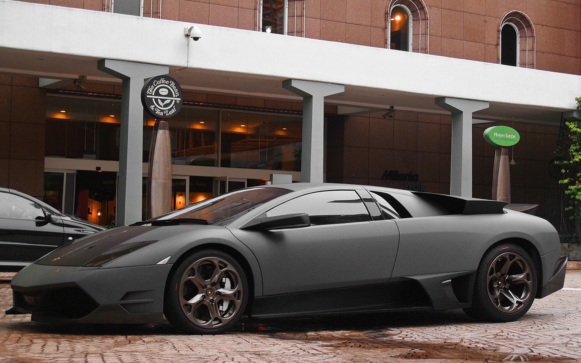 Matte gray Lamborghini parked outside The Coffee Bean HD Wallpaper