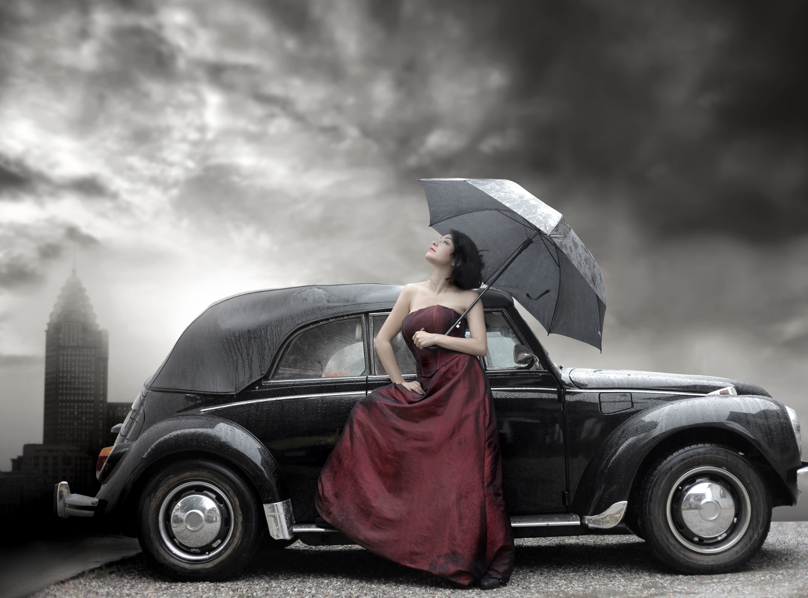 Woman in red dress with umbrella by vintage car HD Wallpaper