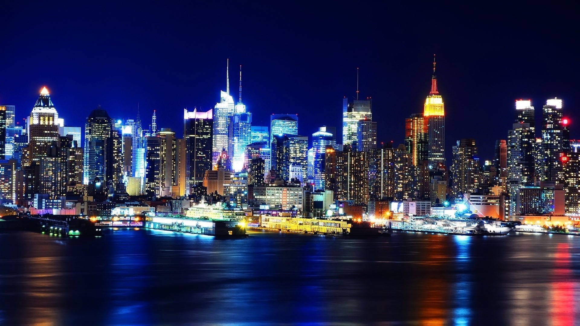 New York City skyline at night with Empire State Building HD Wallpaper