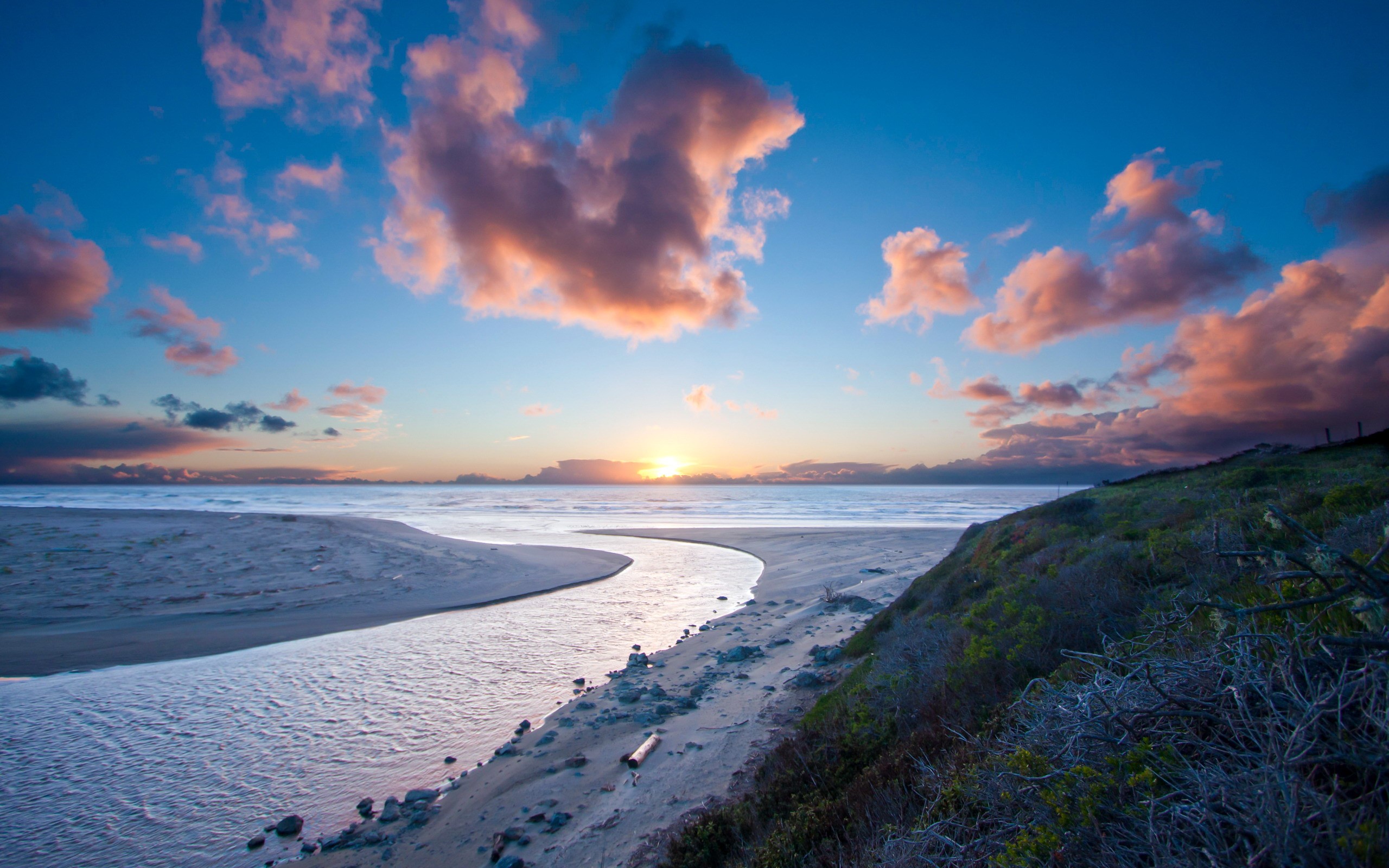 Sunset over ocean with river and clouds HD Wallpaper