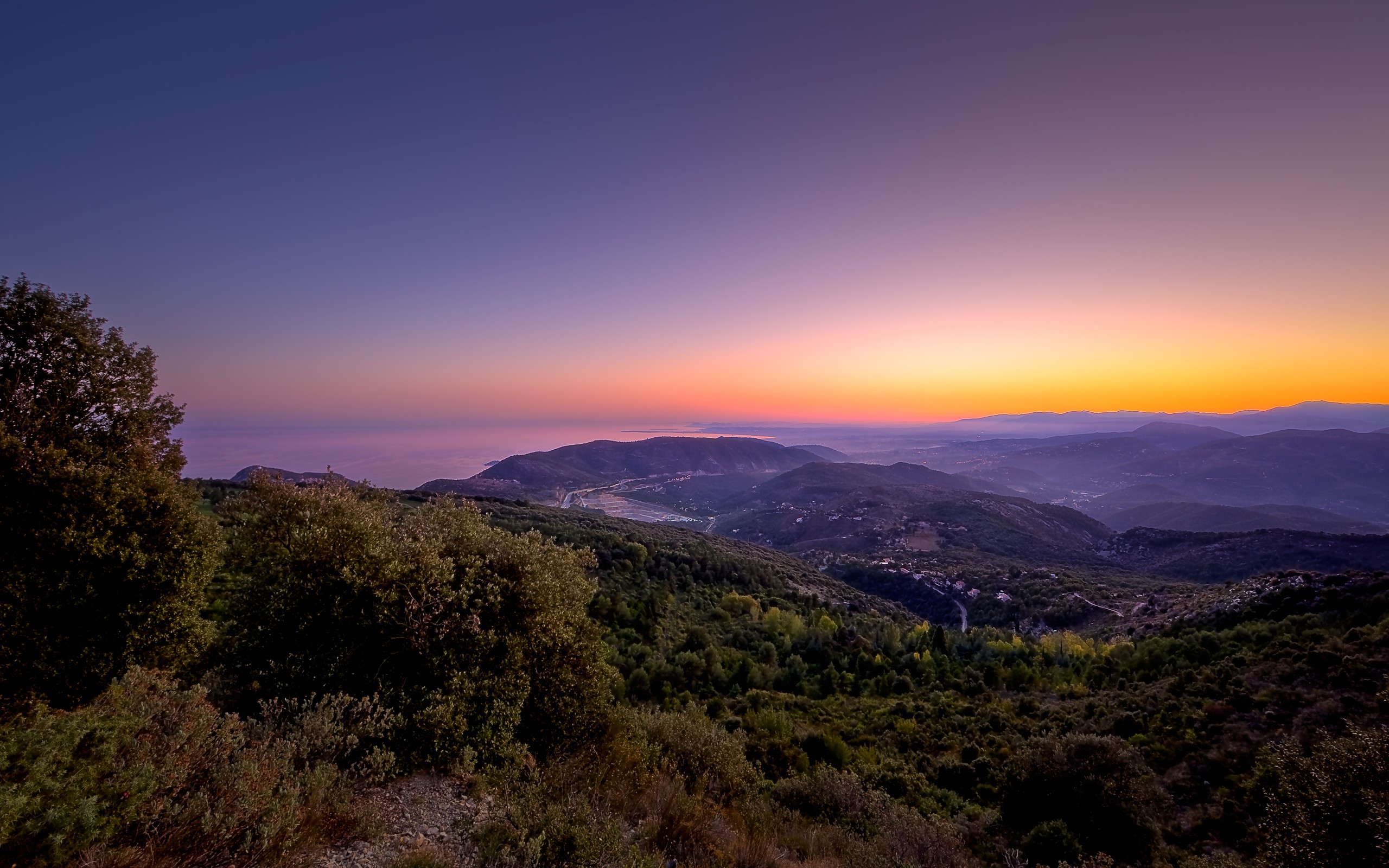 Sunset over mountains and sea HD Wallpaper