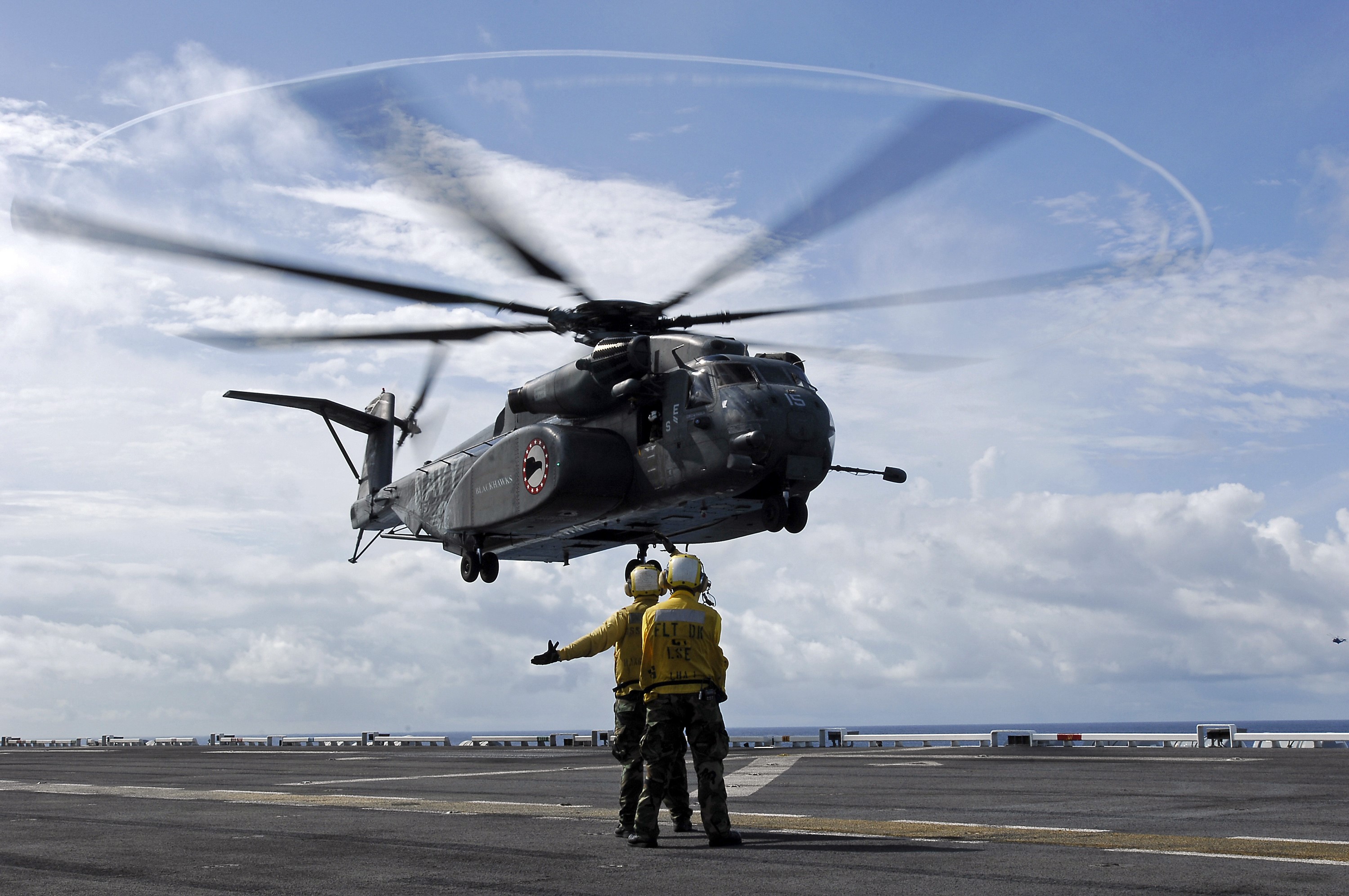 CH-53E Super Stallion helicopter on aircraft carrier HD Wallpaper