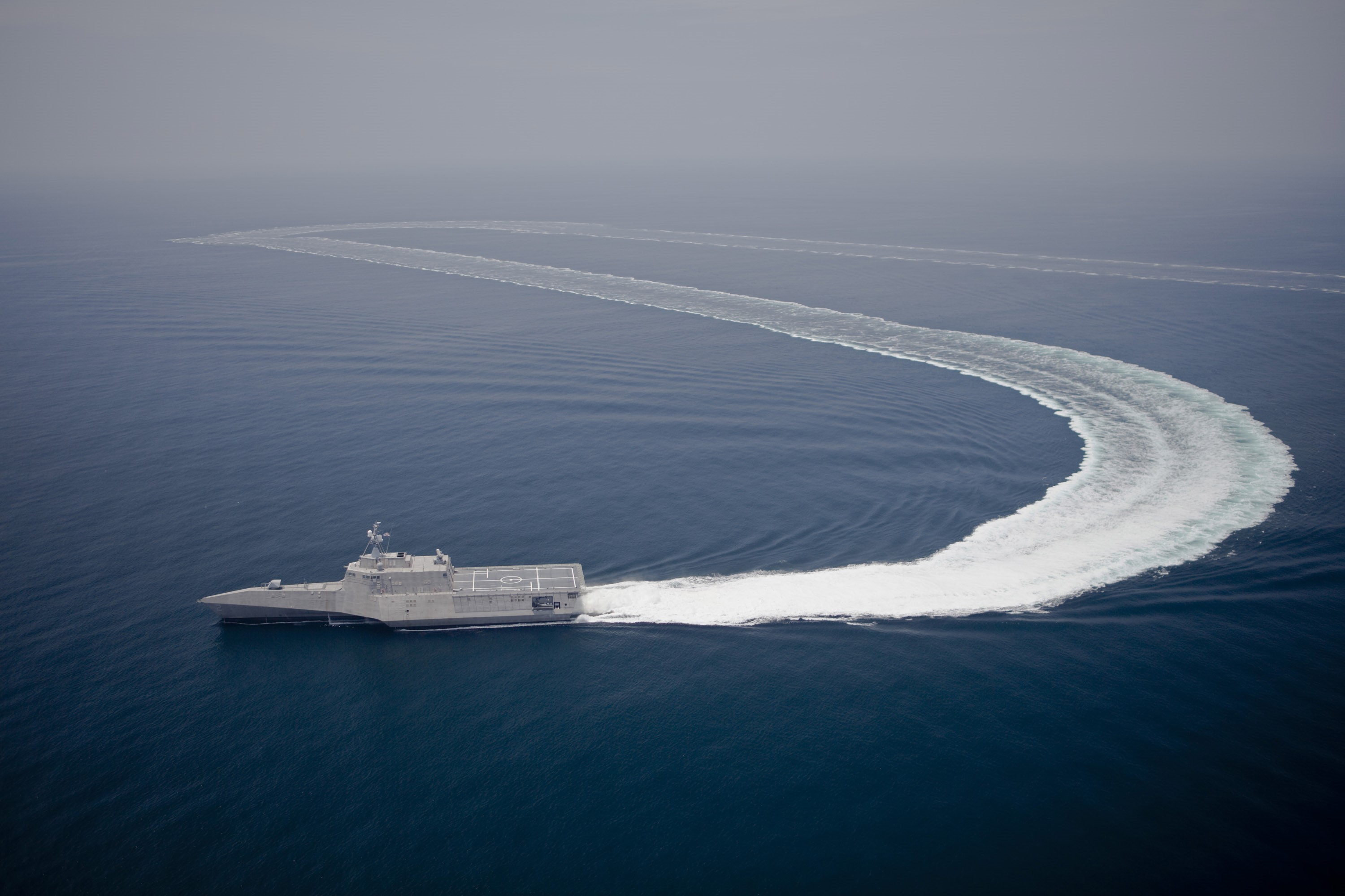 Naval ship making a sharp turn in the ocean HD Wallpaper