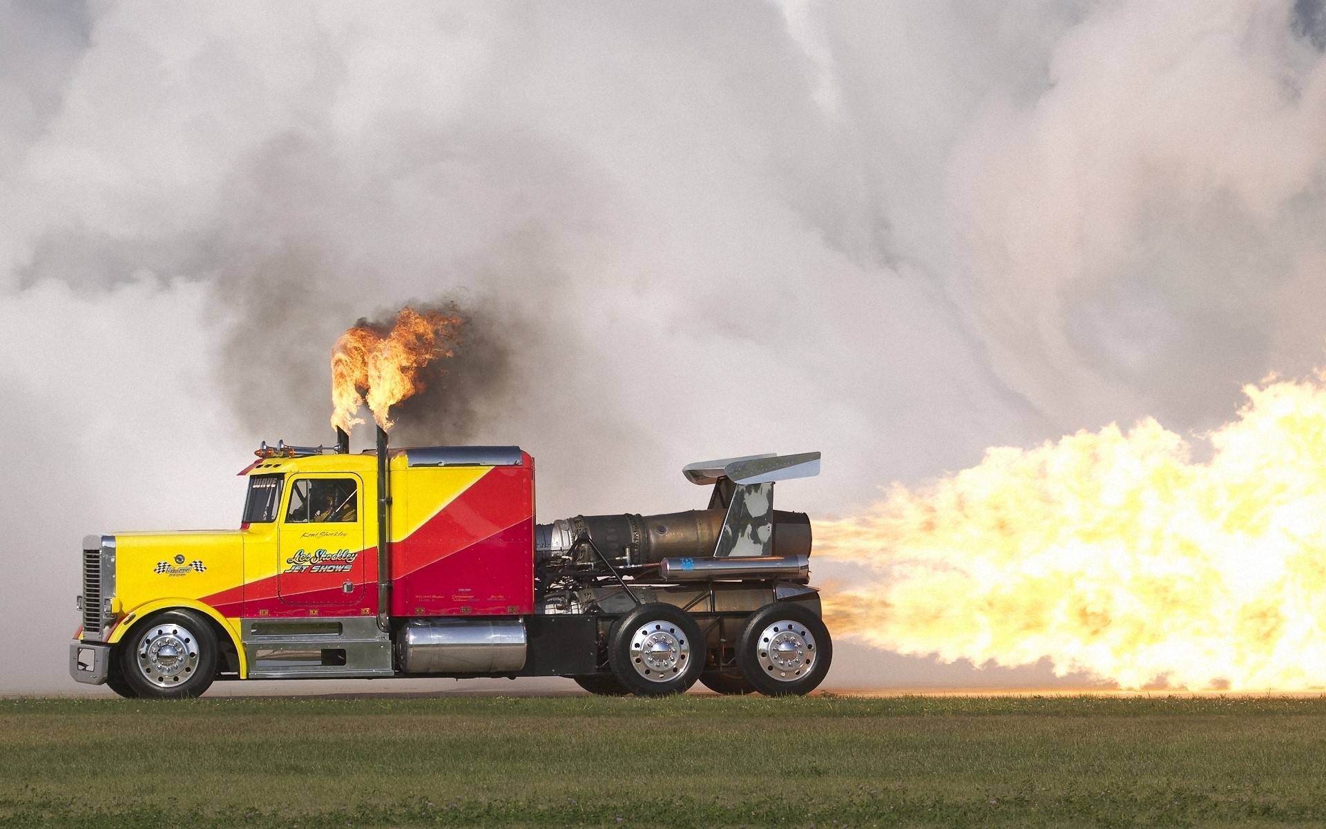 Jet-powered truck with flames and smoke HD Wallpaper