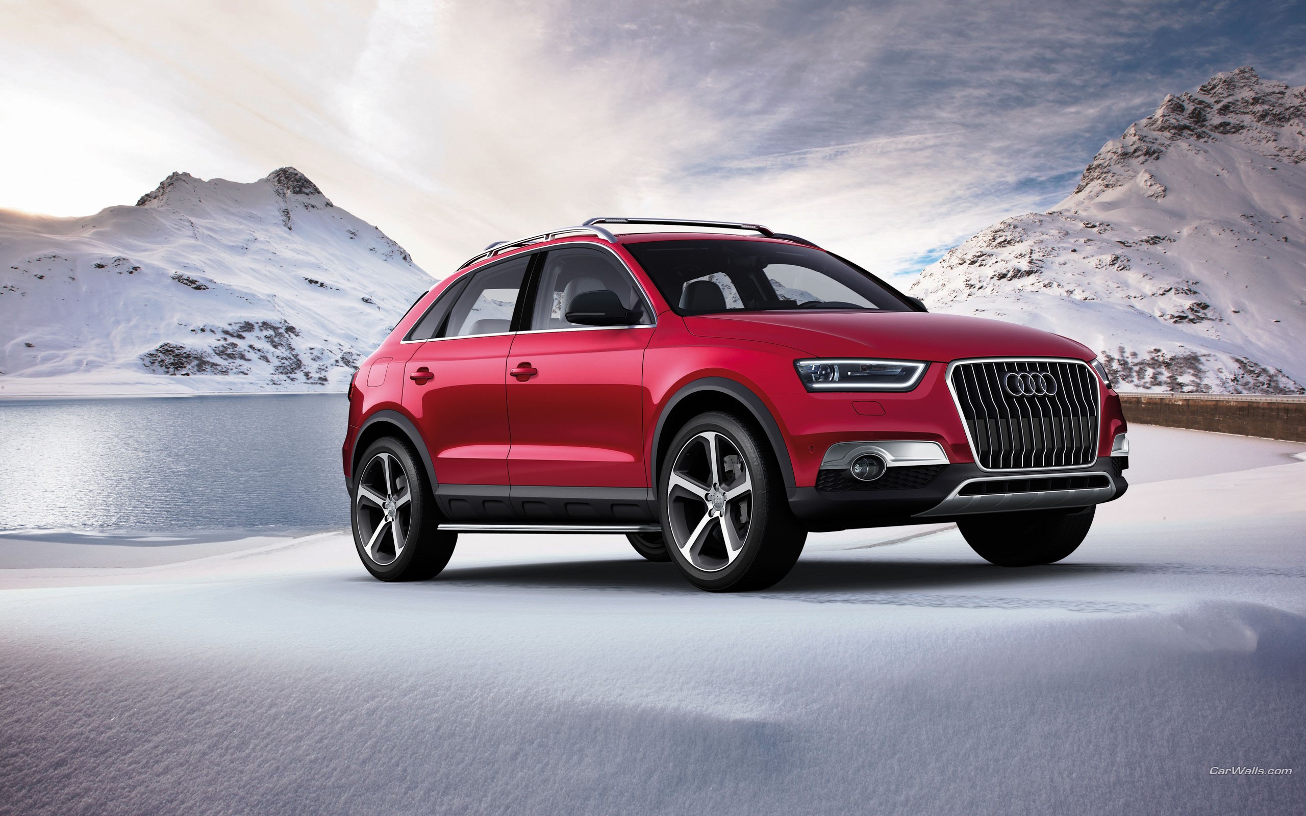 Red Audi Q3 in a Snowy Mountain Landscape HD Wallpaper