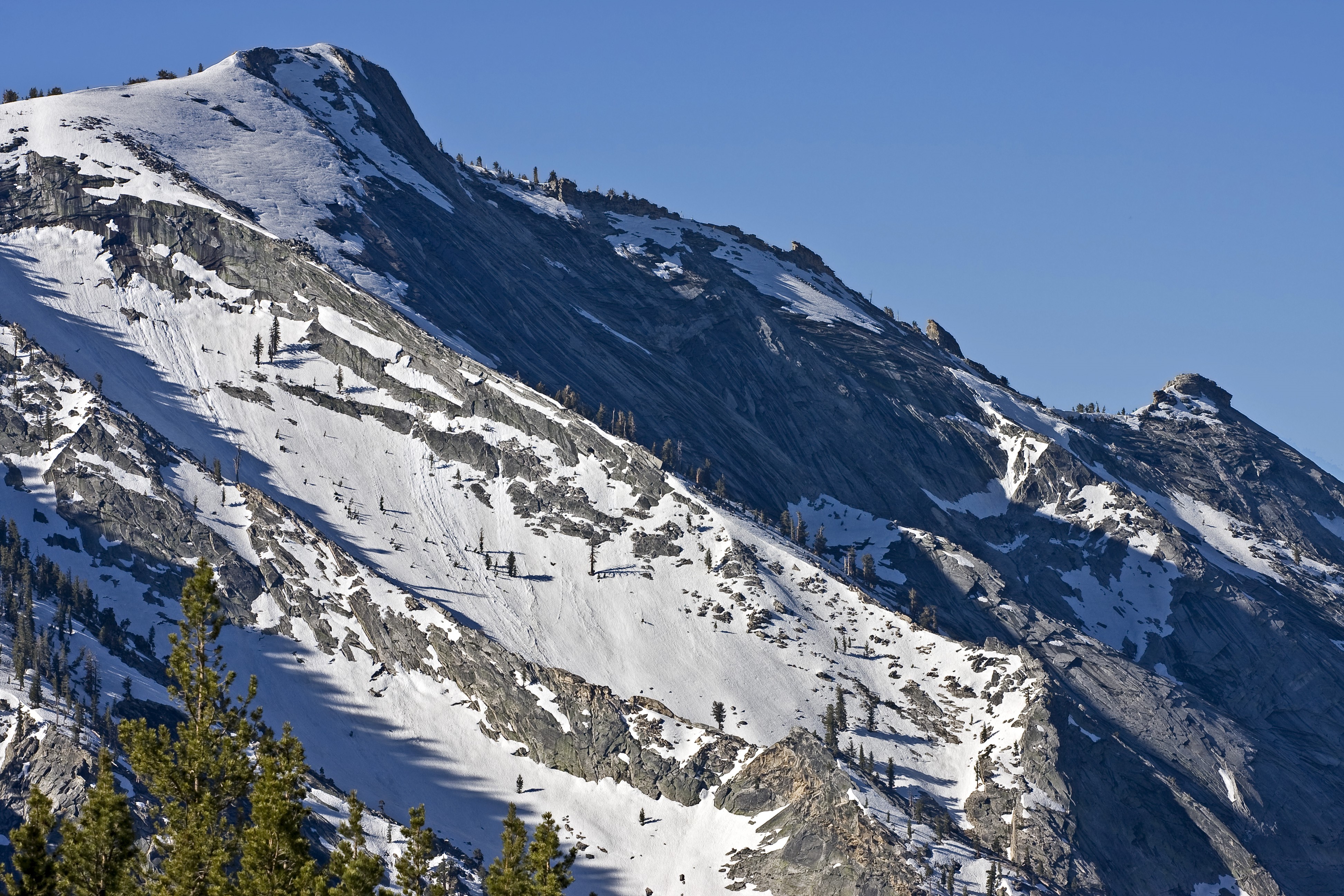 Snow-covered mountains under a clear blue sky HD Wallpaper