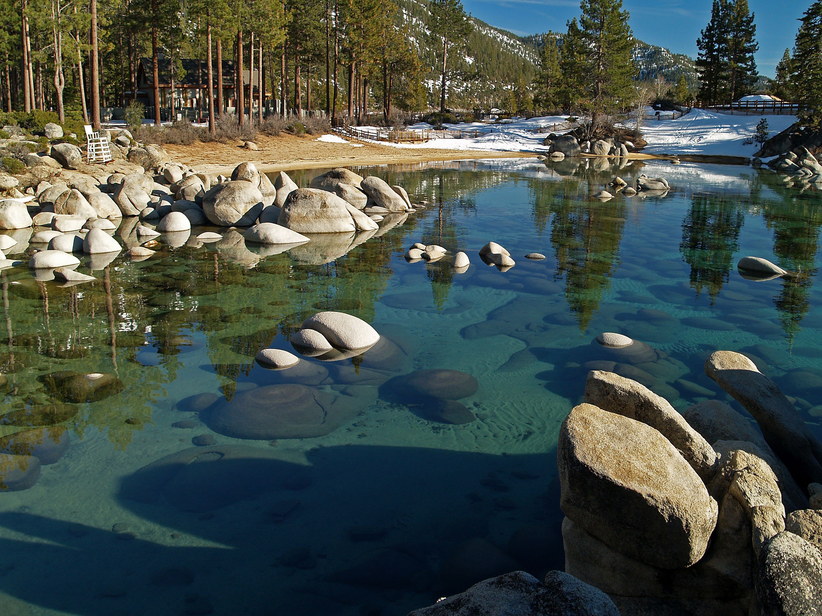 Sand Harbor State Park with clear water and rocks HD Wallpaper