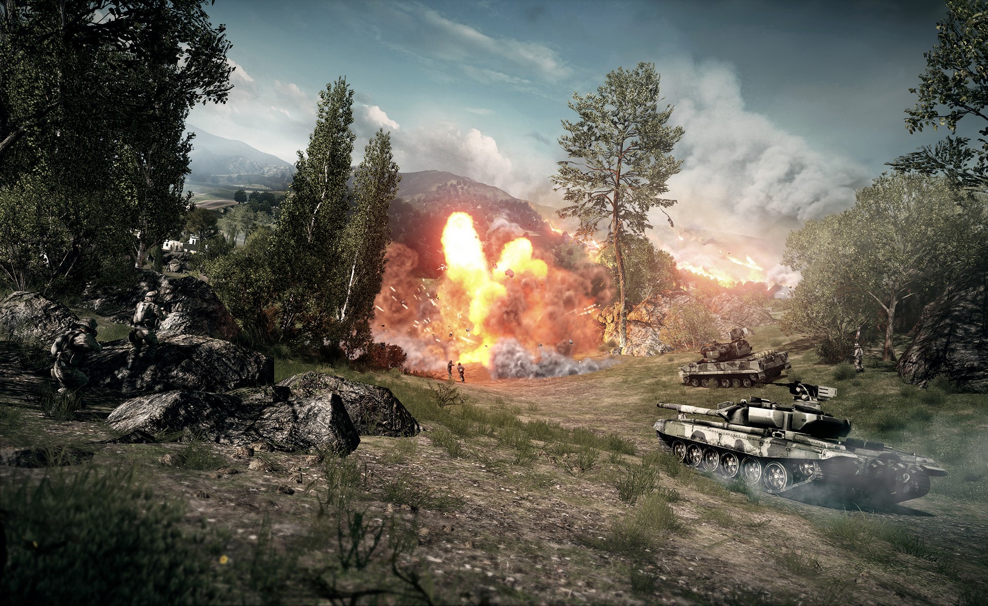 Battlefield tanks and explosion in a rural landscape HD Wallpaper