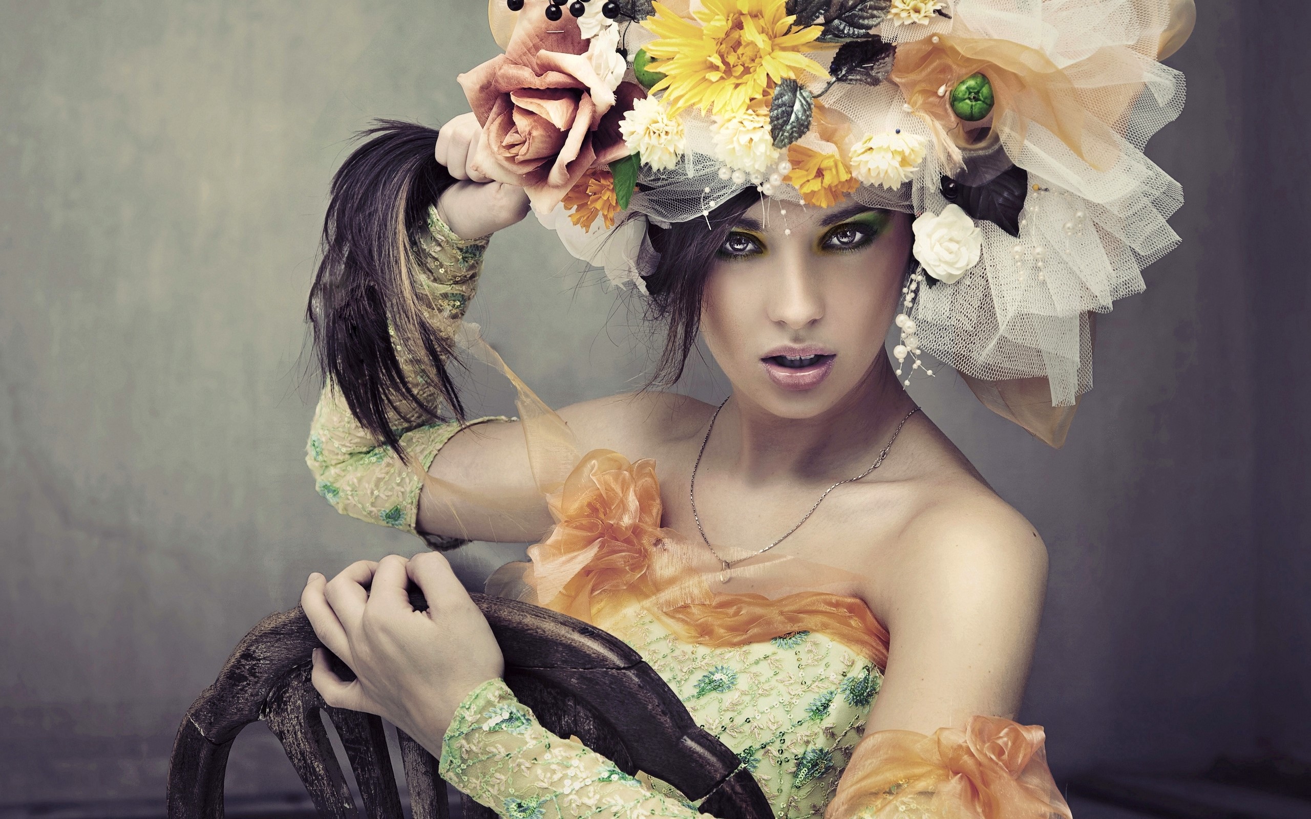 Woman with elaborate floral headdress and green dress HD Wallpaper