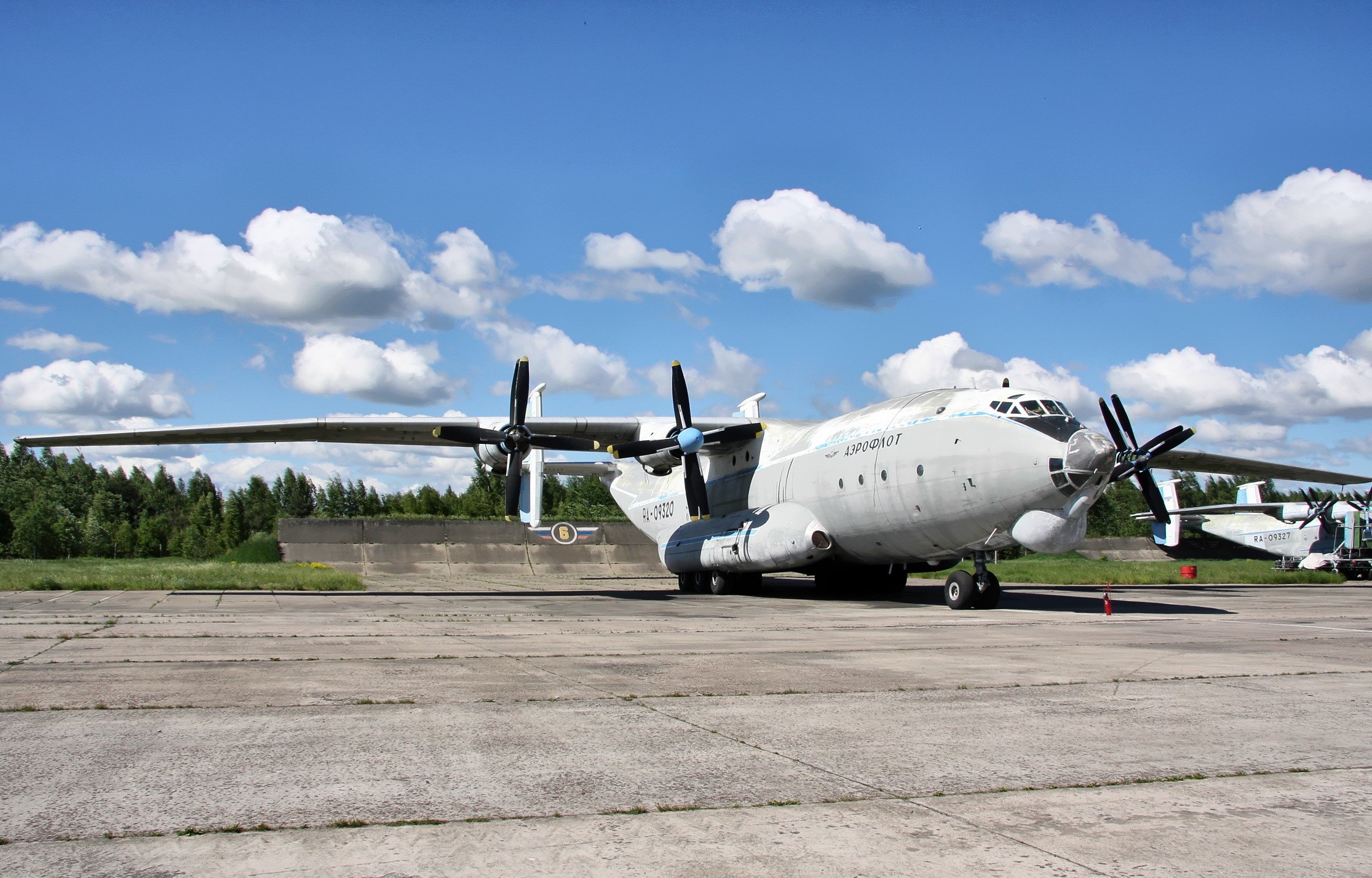 Antonov An-12 transport aircraft on tarmac HD Wallpaper
