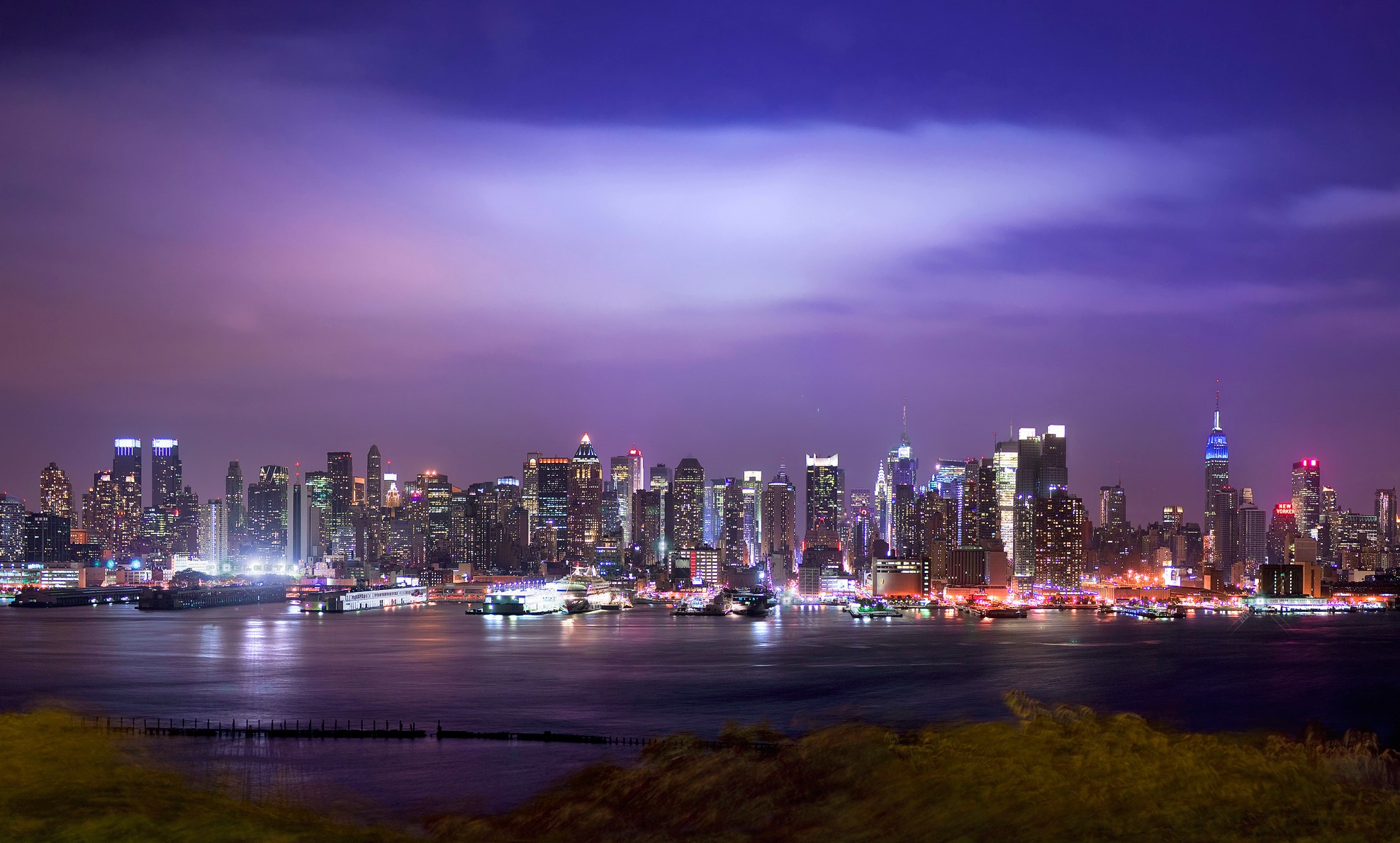 New York City skyline at night over water HD Wallpaper