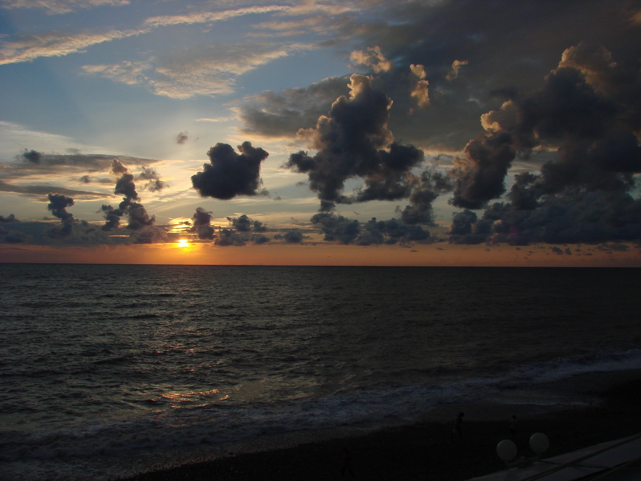 Sunset over the sea with clouds HD Wallpaper