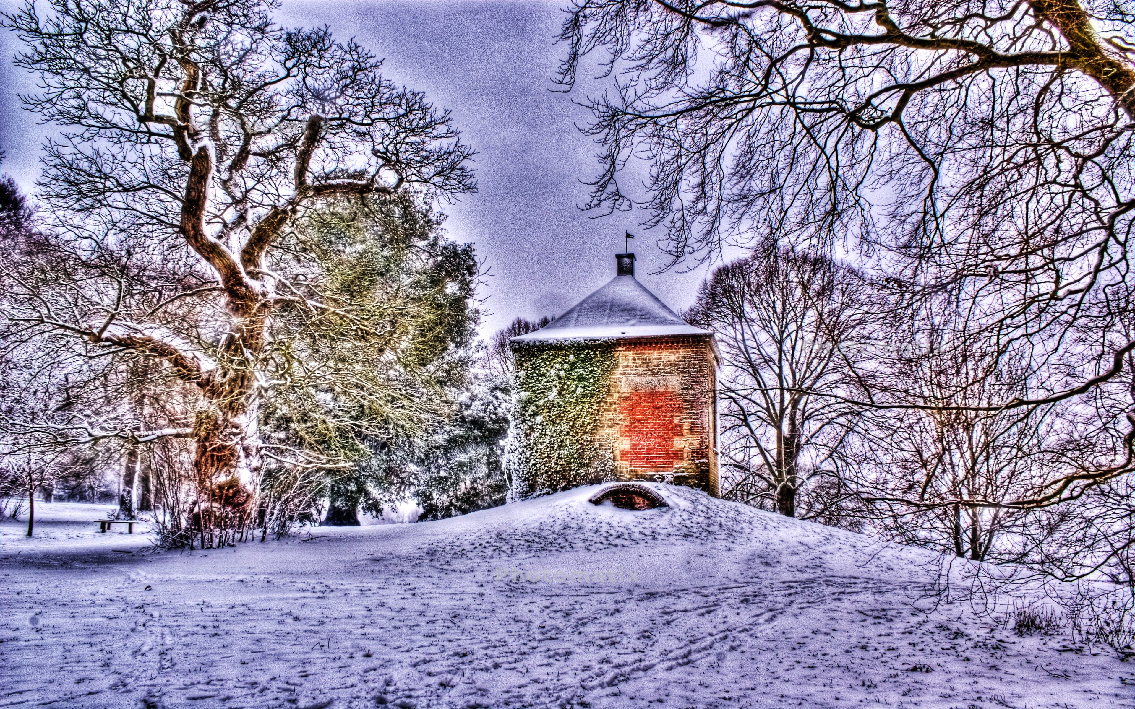Snowy landscape with a stone tower and trees HD Wallpaper