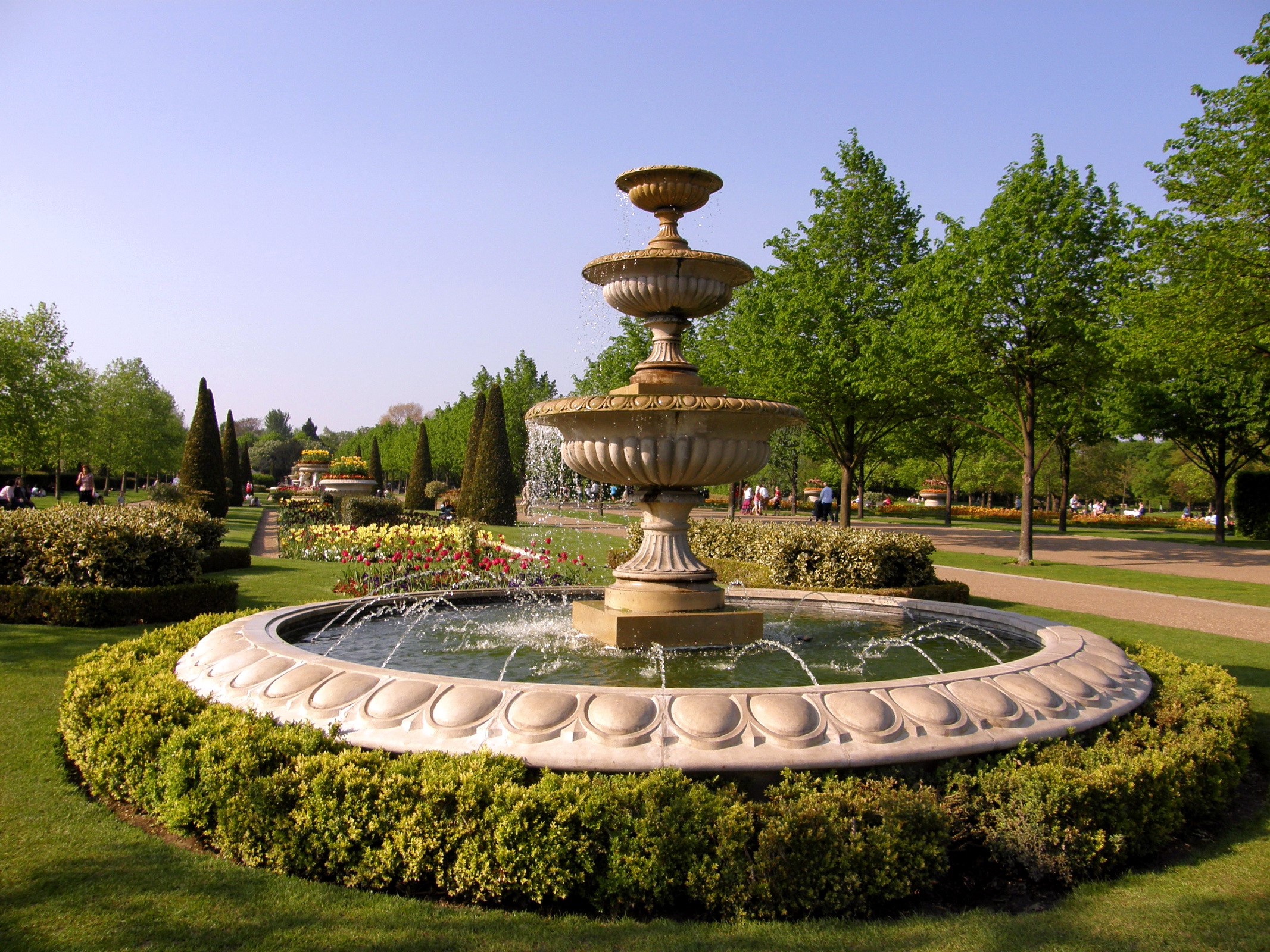 Fountain in a park with trees and flowers HD Wallpaper
