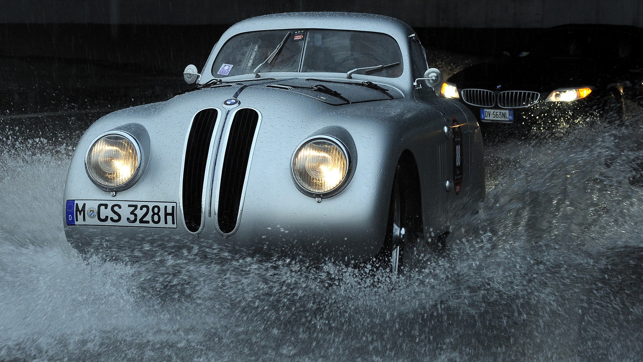 Silver BMW driving through water HD Wallpaper