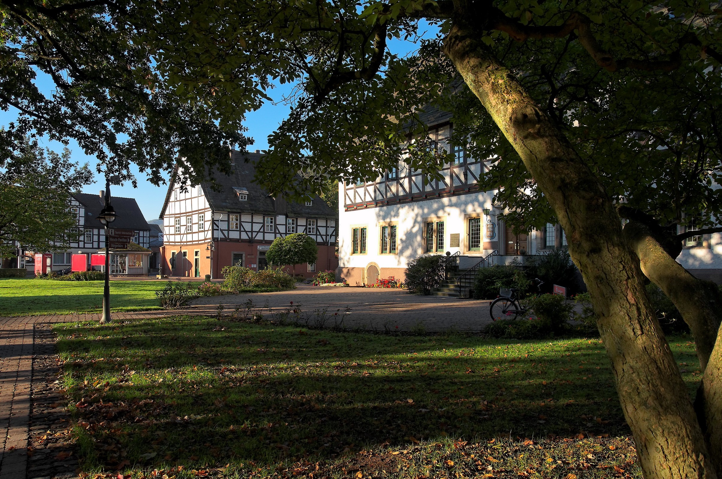 Half-timbered houses in a German town square HD Wallpaper
