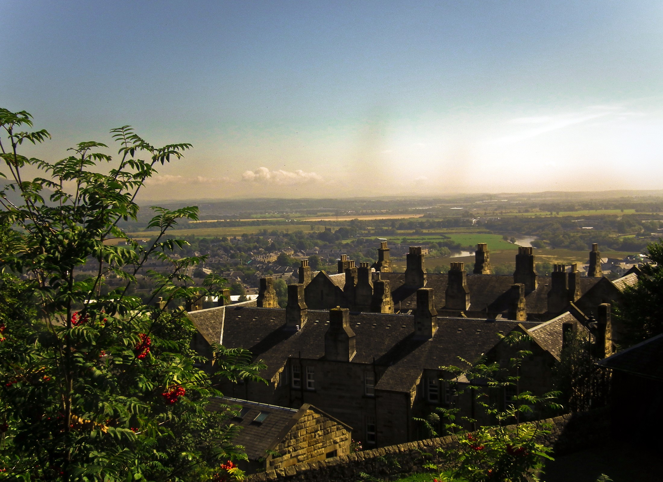 View of Stirling Castle rooftops and landscape HD Wallpaper