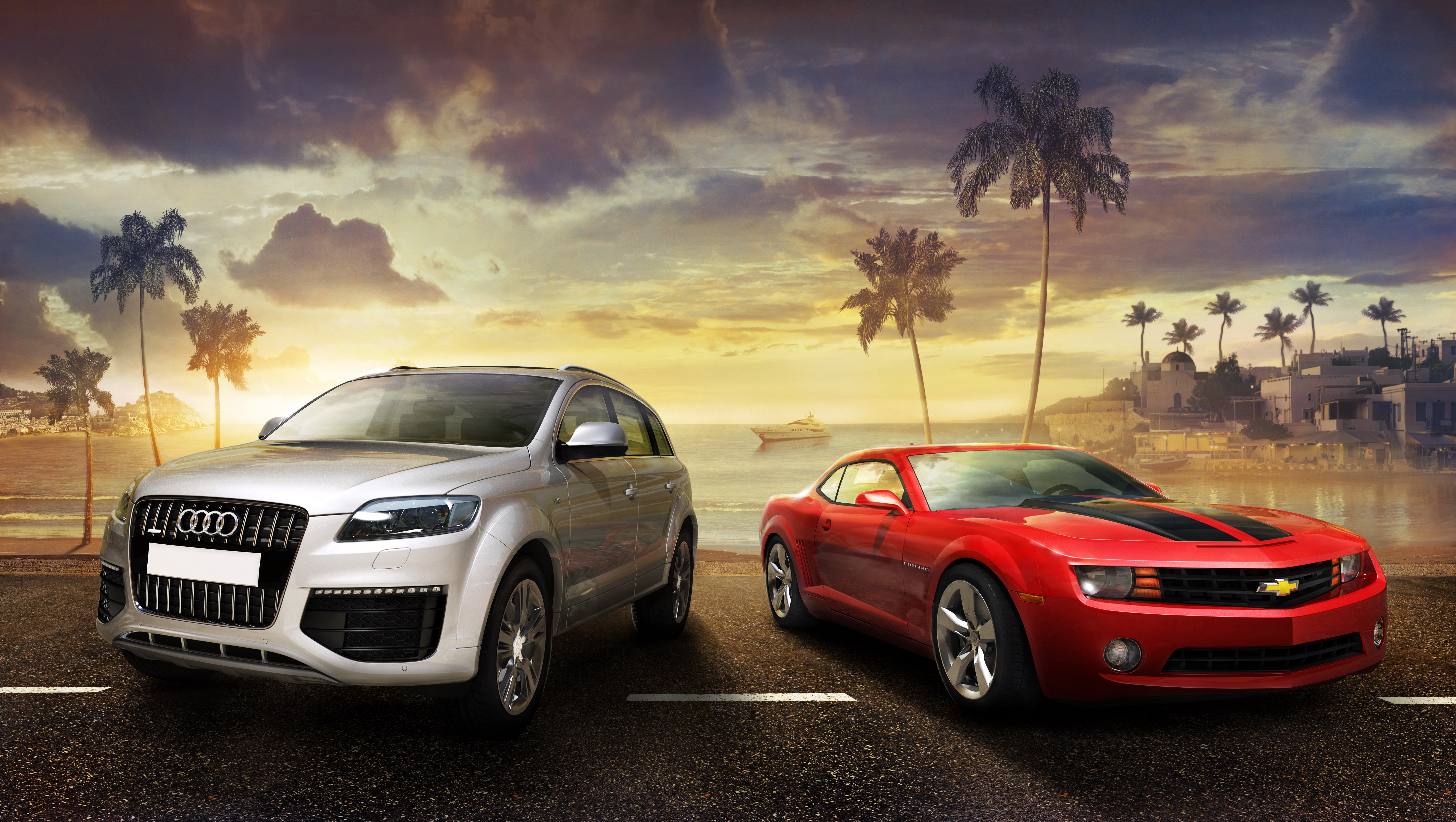 Audi and Chevrolet Camaro on a beach road HD Wallpaper