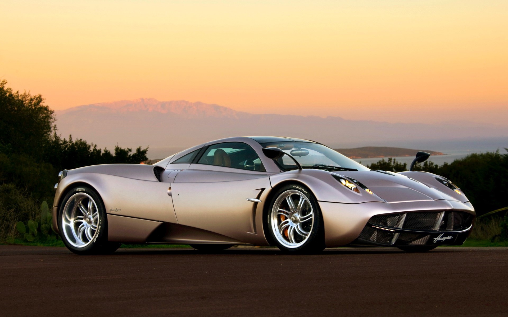 Pagani Huayra sports car at sunset HD Wallpaper