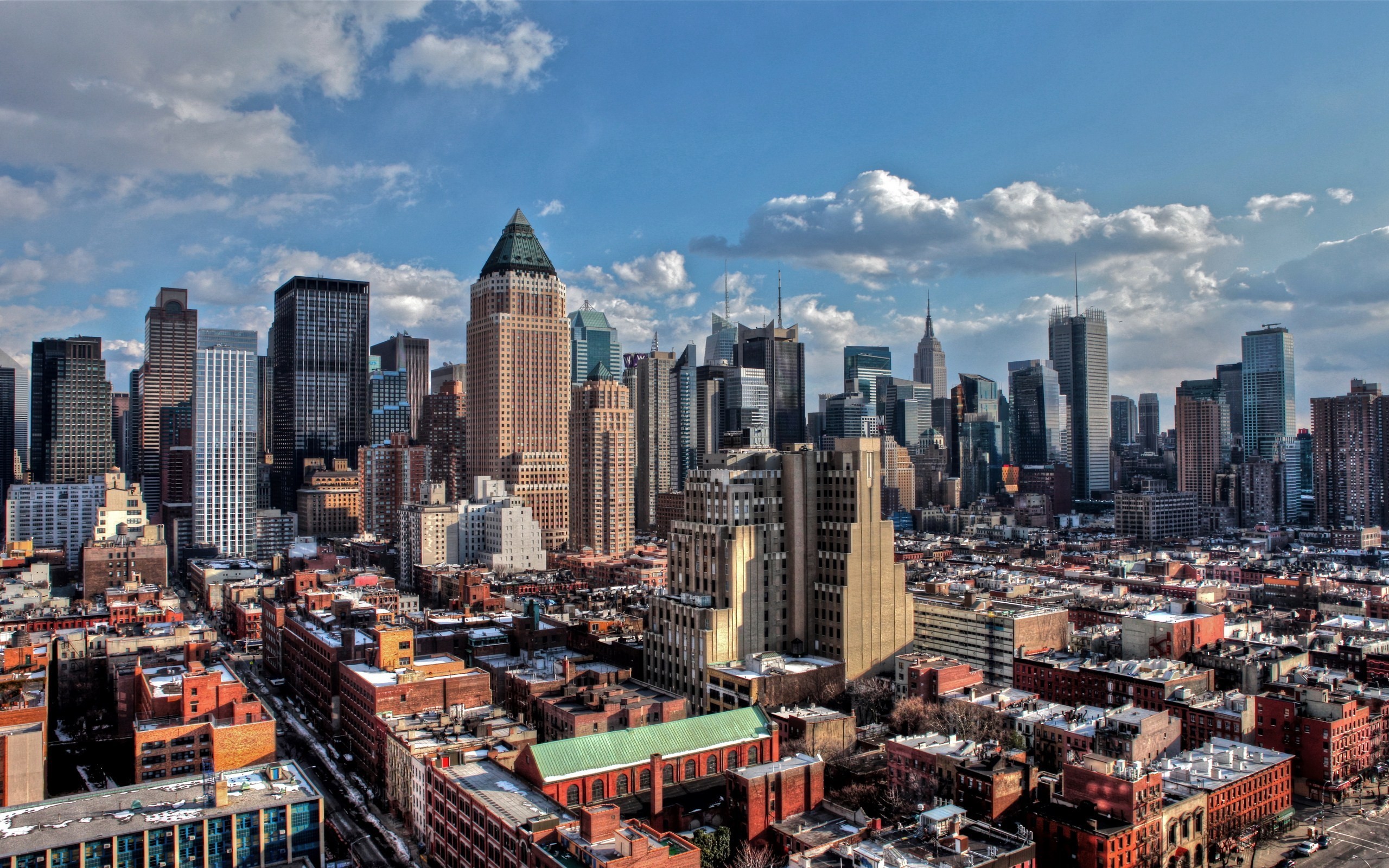 New York City Skyline with Buildings and Clouds HD Wallpaper