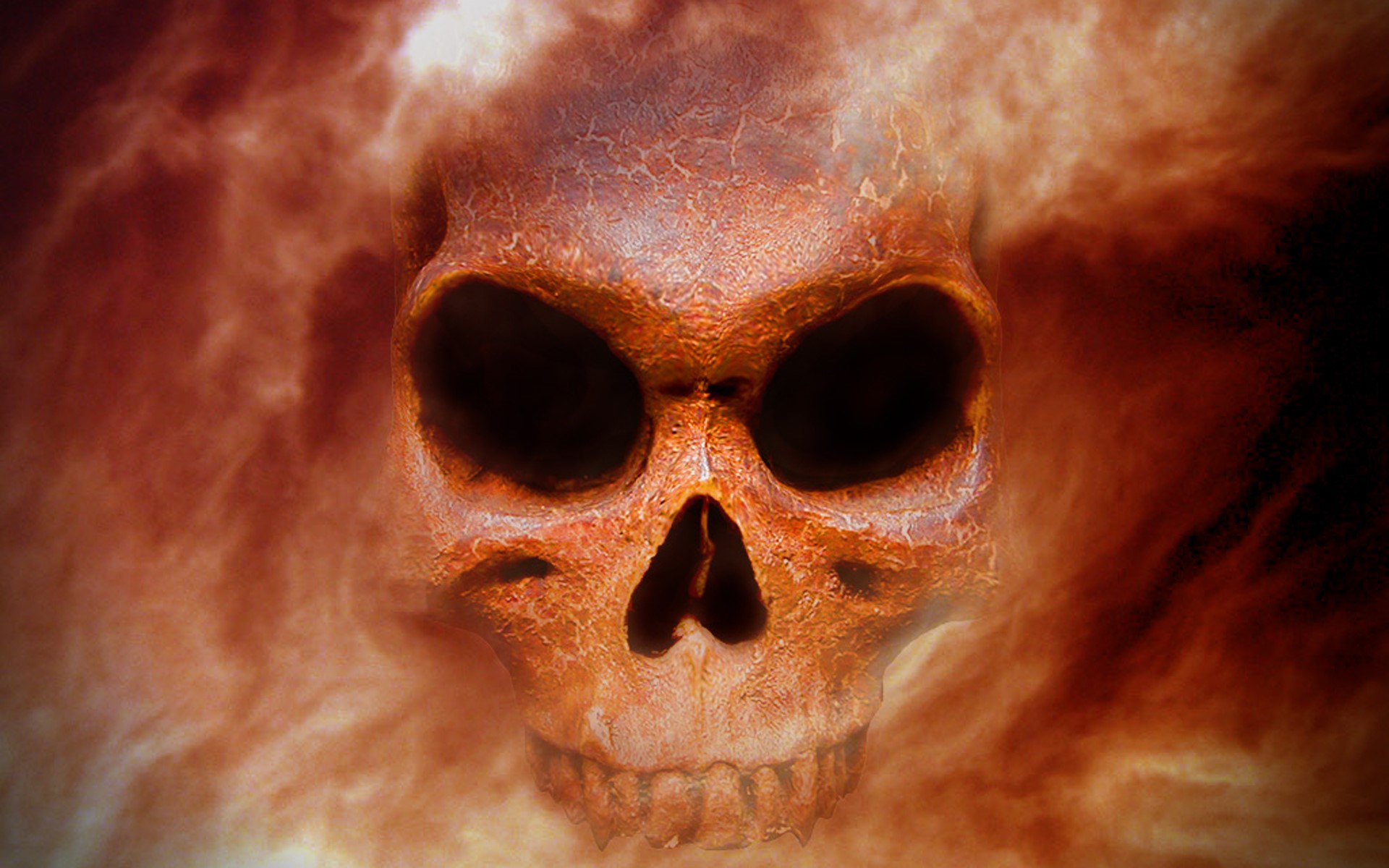 A fiery skull emerges from smoke HD Wallpaper